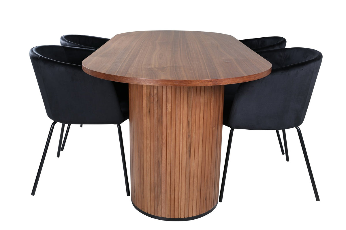 Ovaler Esstisch aus Nussbaum-MDF mit Furnier und vier schwarzen Esszimmerstühlen mit Samtsitz und schmalen Eisenbeinen von Venture Home.