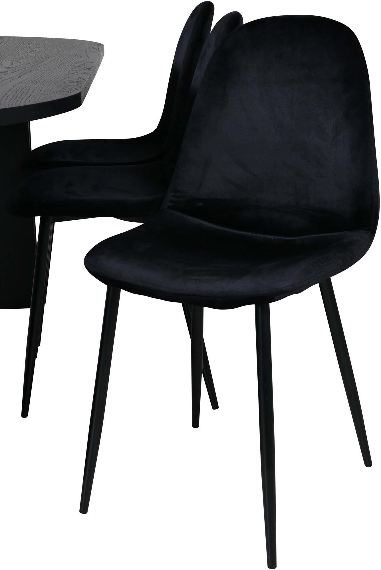 Elegantes Esszimmerset mit ovalem Tisch und 6 luxuriösen Samtstühlen. Ideal für gesellige Abende und stilvolle Anlässe.