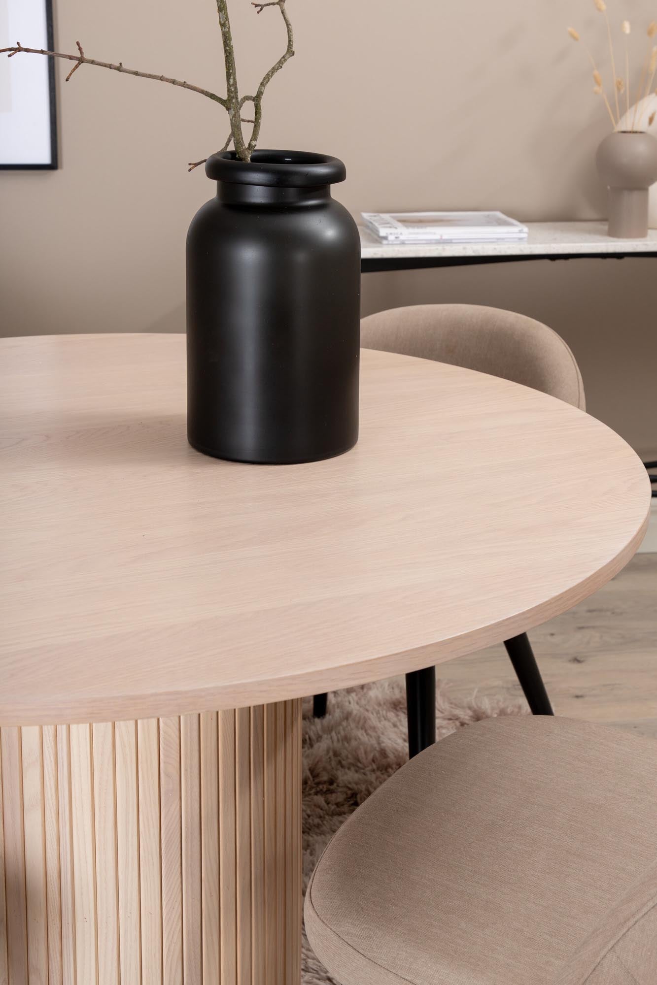 Elegantes Bianca Esszimmerset: Runder Tisch mit 4 Samtstühlen.