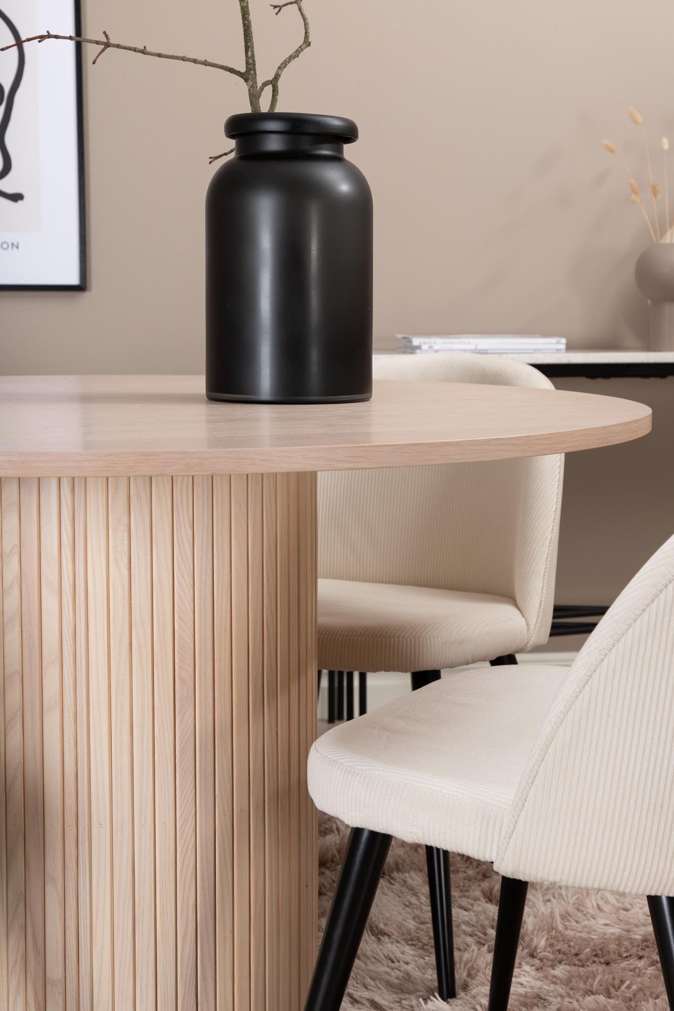 Stilvolles Bianca Esszimmerset: Runder Tisch mit 4 Samtstühlen.