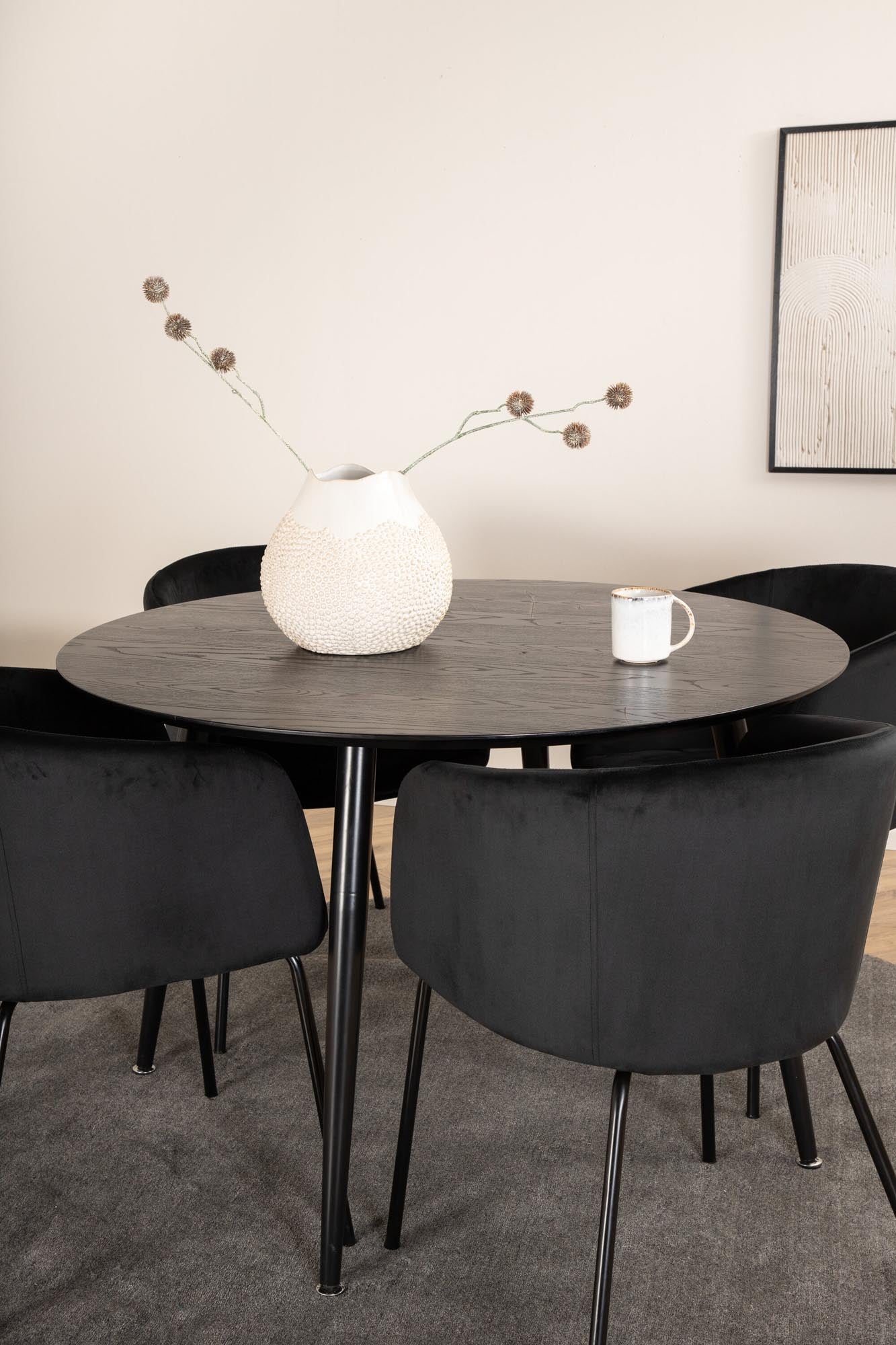 Elegantes Dipp Esszimmerset mit runden Tisch und 4 stilvollen Berit Stühlen. Hochwertige Materialien für Komfort und modernes Design.