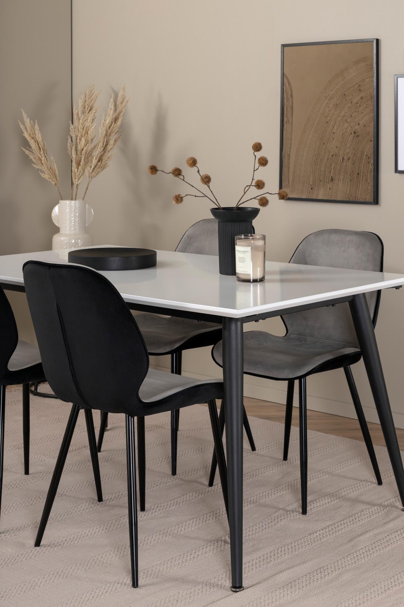 Stilvolles Esszimmerset mit ausziehbarem Jimmy Tisch und 4 komfortablen Emma Stühlen in modernem Design für gesellige Abende.