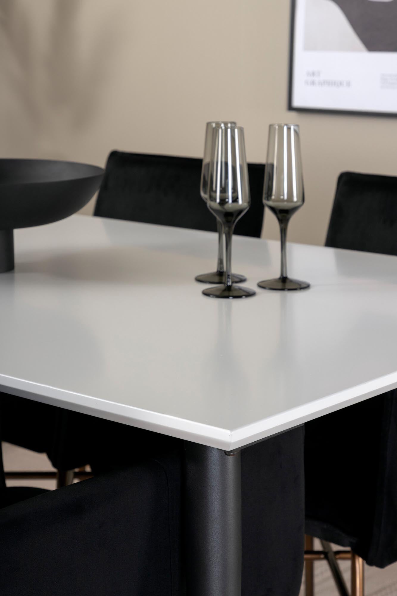 Elegantes Esszimmerset Jimmy mit ausziehbarem Petra Tisch (150-240 cm) und luxuriösen Samtstühlen für stilvolle Essmomente.