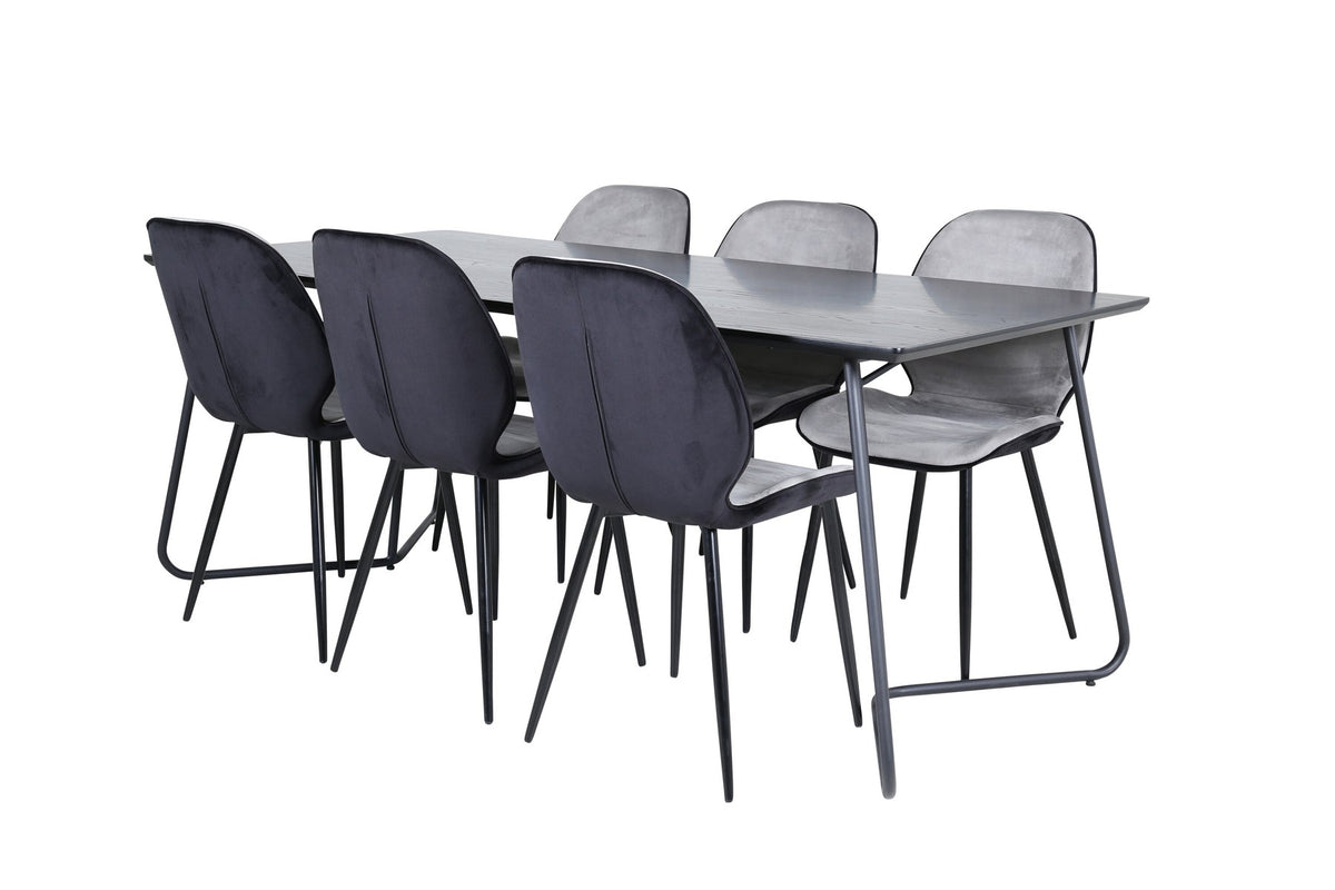 Esszimmerset Emma & Petra von Venture Home: rechteckiger Tisch aus MDF mit Furnier in Schwarz und zwei Stühle mit Bugholzgestell in Grau.