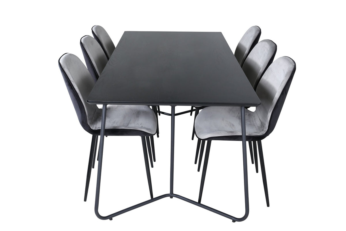 Esszimmerset Emma & Petra von Venture Home: rechteckiger Tisch aus MDF mit Furnier in Schwarz und zwei Stühle mit Bugholzgestell in Grau.