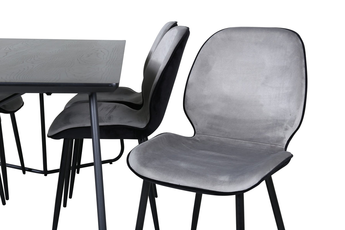 Esszimmerset Emma & Petra von Venture Home: rechteckiger Tisch aus MDF mit Furnier in Schwarz und zwei Stühle mit Bugholzgestell in Grau.