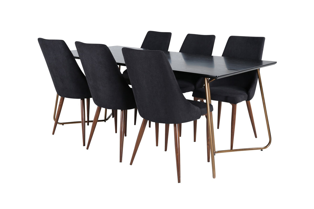 Rechteckiger Esstisch aus schwarzem MDF mit Furnier und Stahlbeinen, dazu zwei Esszimmerstühle mit schwarzer Sitzfläche und Metallgestell.