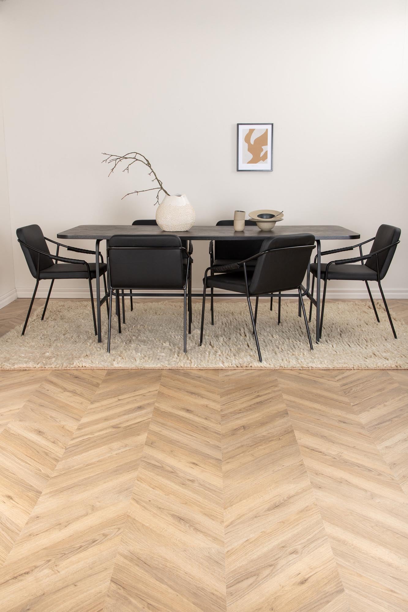 Modernes Esszimmerset mit 200cm Tisch, 6 Stühlen aus schwarzem Kunstleder, ideal für gesellige Runden und stilvolle Anlässe.