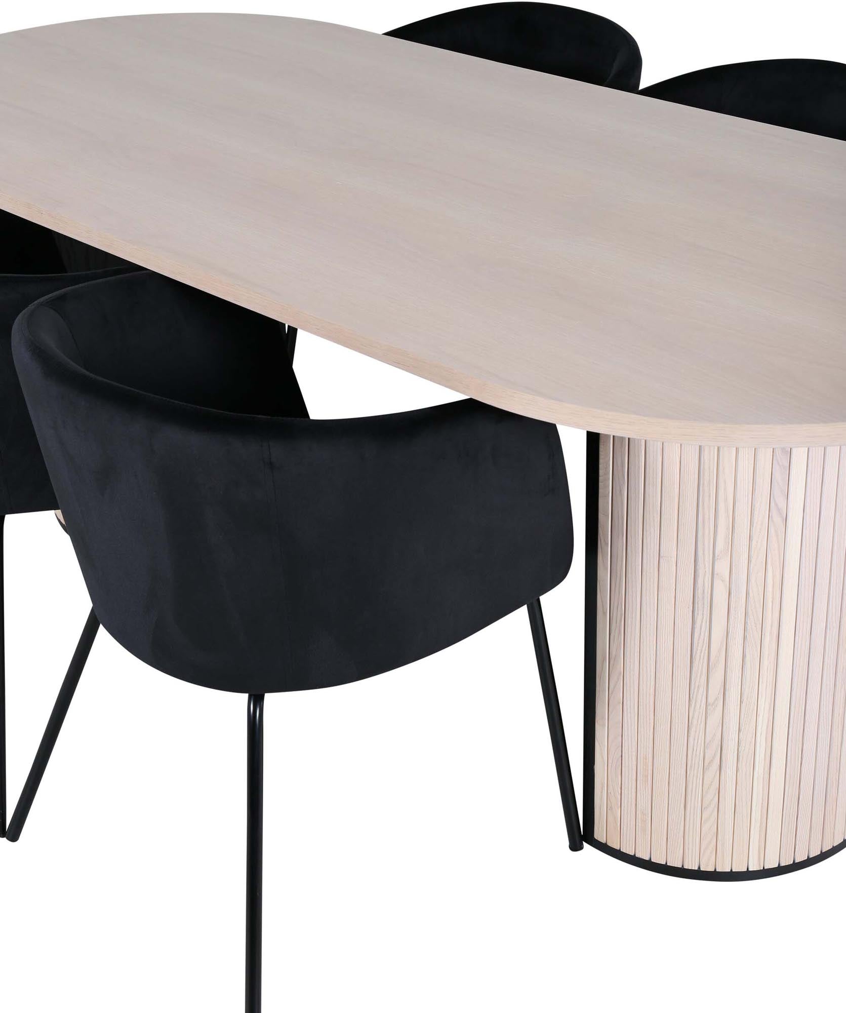 Stilvolles Bianca Esszimmerset mit ovalem Tisch und luxuriösen Samtstühlen. Ideal für gesellige Runden und elegantes Wohnen.