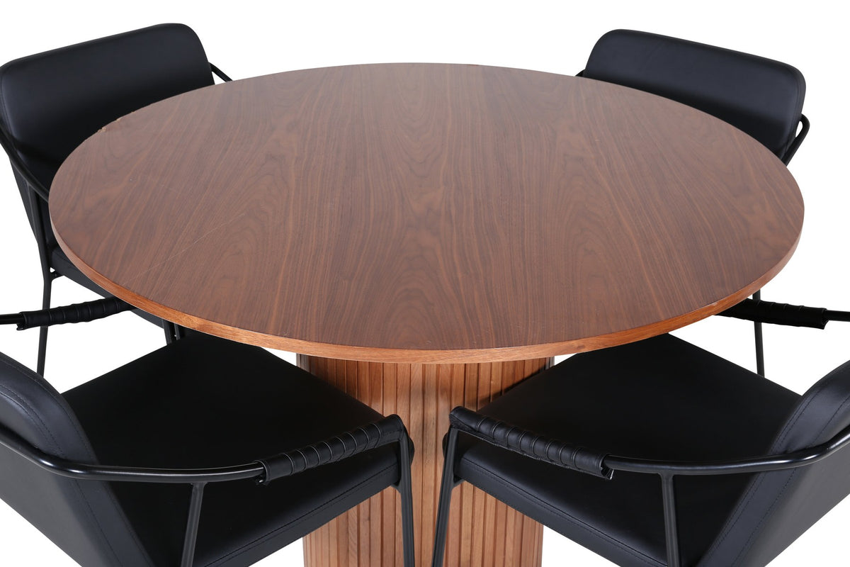 Rundes Esszimmerset mit Tisch aus MDF in Nussbaum-Optik ⌀110 cm und zwei schwarzen Stühlen mit Pulverbeschichtung und Eisenbeinen.