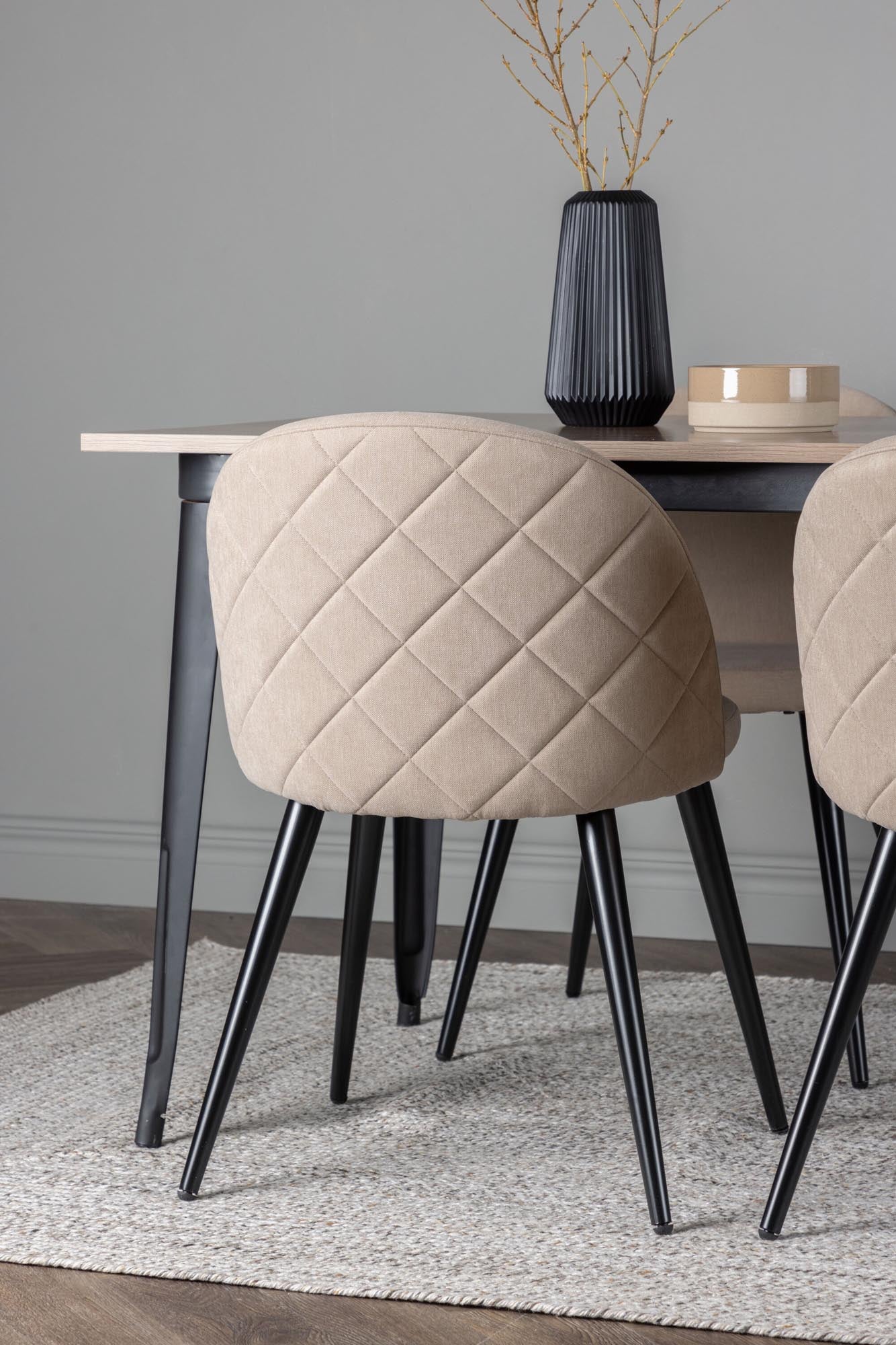 Modernes Tempe Esszimmerset: Robuster Walnusstisch, stilvolle schwarze Metallbeine und luxuriöse Samtstühle. Ideal für gesellige Momente.