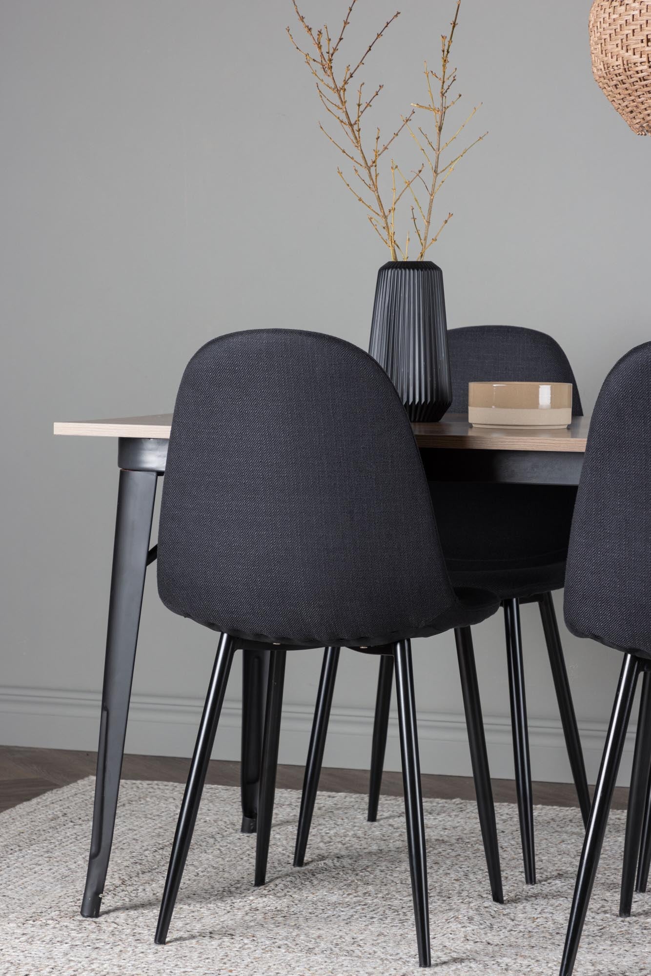 Elegantes Esszimmerset Tempe: 140 cm Tisch aus Walnuss-MDF, robuste Metallbeine und komfortable Polar-Stühle. Ideal für skandinavisches Wohnen.