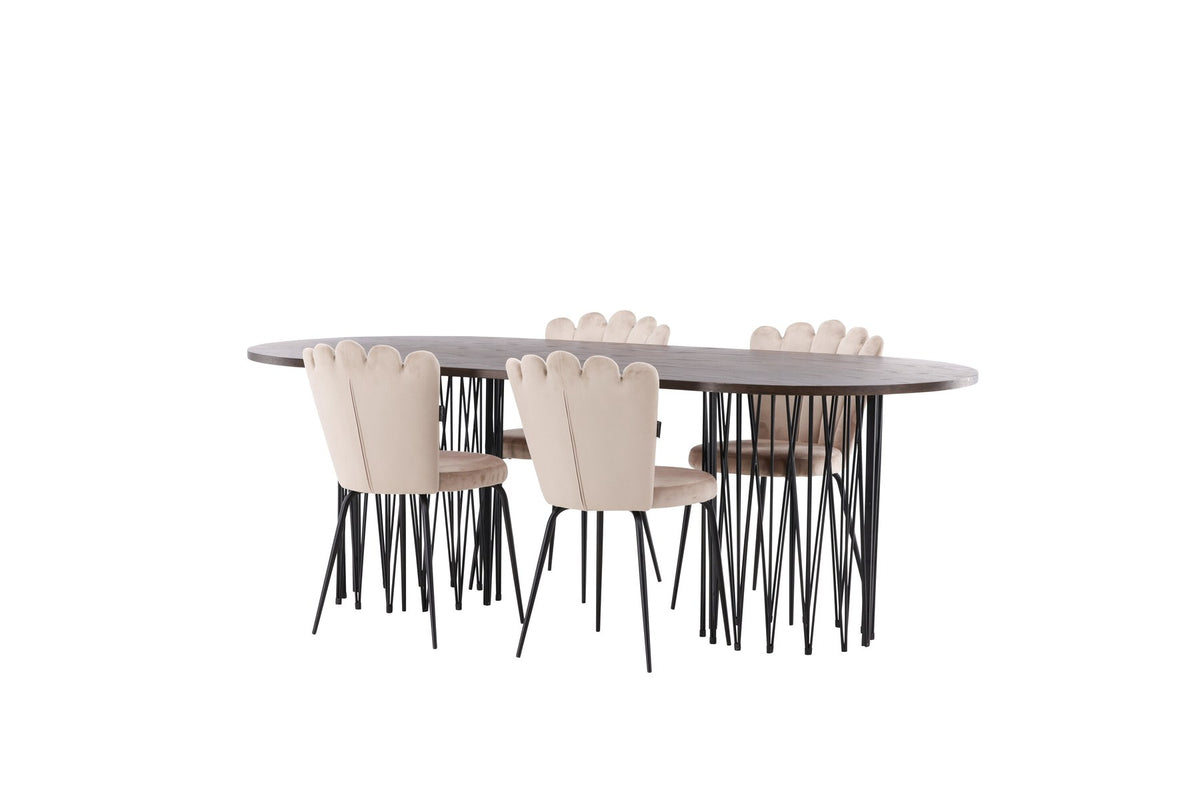 Ovaler Esstisch mit Tischplatte aus MDF mit Mocca-Furnier und schwarzem Metallgestell, umgeben von vier Limhamn-Stühlen mit beigem Samtbezug.