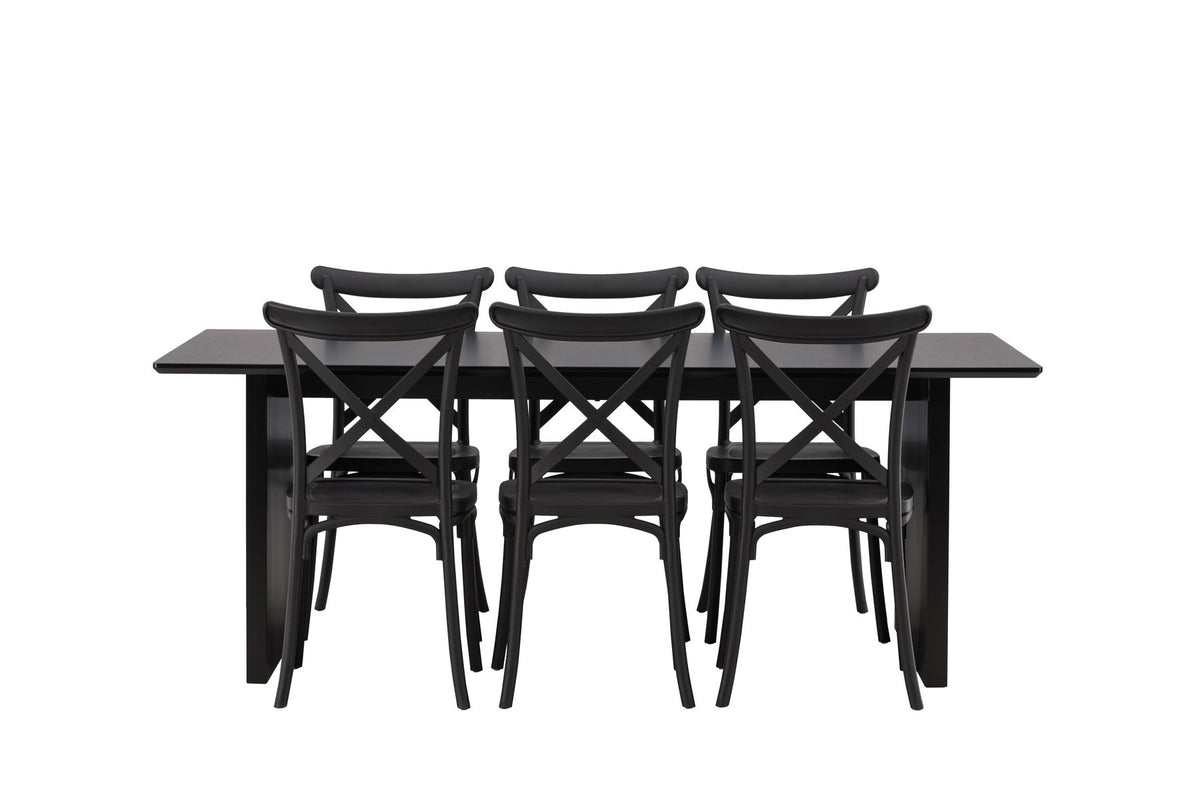 Esszimmerset aus rechteckigem MDF-Tisch in Rauchschwarz mit sechs Limhamn-Stühlen, beiger Samtbezug, muschelförmige Rückenlehne, schwarze Metallbeine.