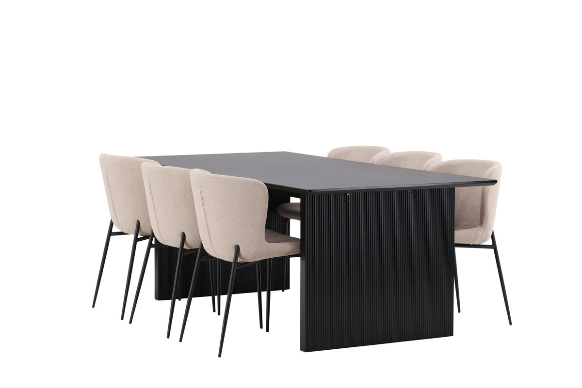 Esszimmerset aus rechteckigem MDF-Tisch in Rauchschwarz mit sechs Limhamn-Stühlen, beiger Samtbezug, muschelförmige Rückenlehne, schwarze Metallbeine.