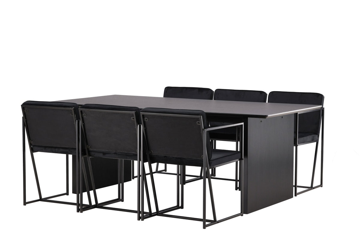 Esszimmerset aus rechteckigem MDF-Tisch in Rauchschwarz mit sechs Limhamn-Stühlen, beiger Samtbezug, muschelförmige Rückenlehne, schwarze Metallbeine.