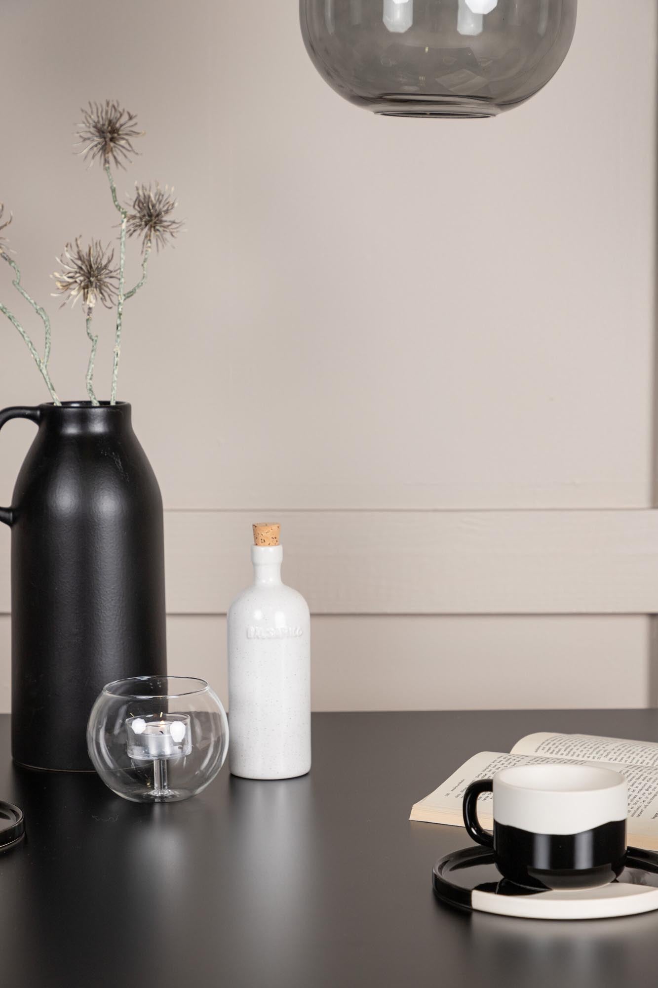 Elegantes Esszimmerset Tempe mit robustem Tisch und bequemen Modesto-Stühlen. Ideal für stilvolle Dinner und gemütliche Zusammenkünfte.