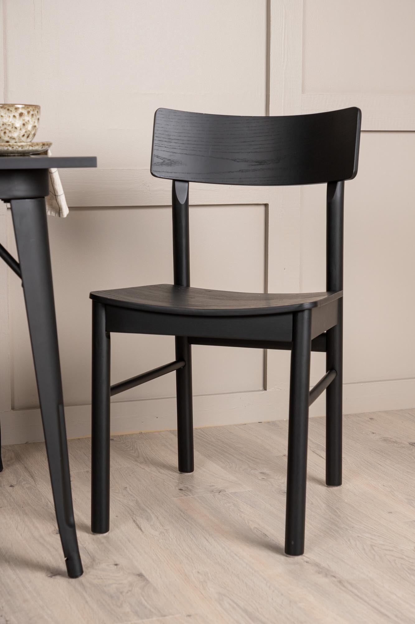 Stilvolles Esszimmerset Tempe mit Montros-Stühlen, ideal für kleine Räume. Elegantes Design, robuste Materialien und hoher Komfort.