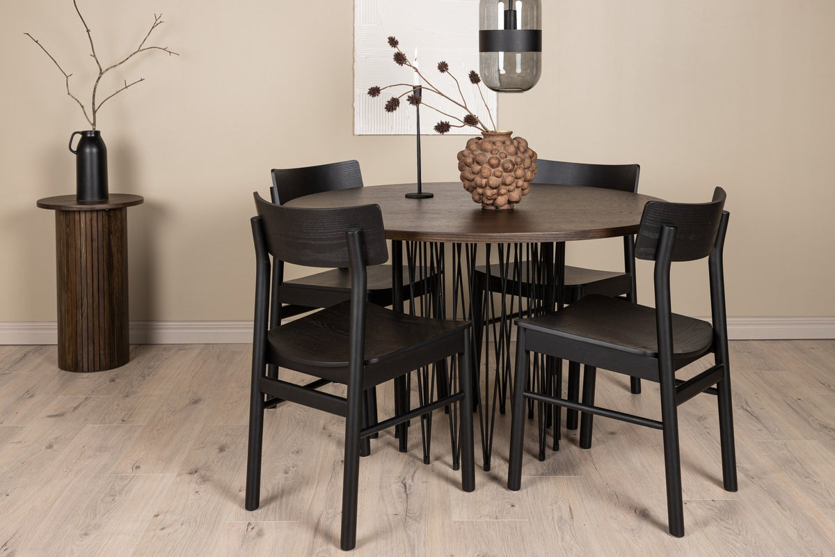 Rundes Esszimmerset mit Steinlook-Tisch aus MDF und Mocca-Furnier, schwarzem Metallgestell und vier Limhamn-Stühlen mit beigem Samtbezug.