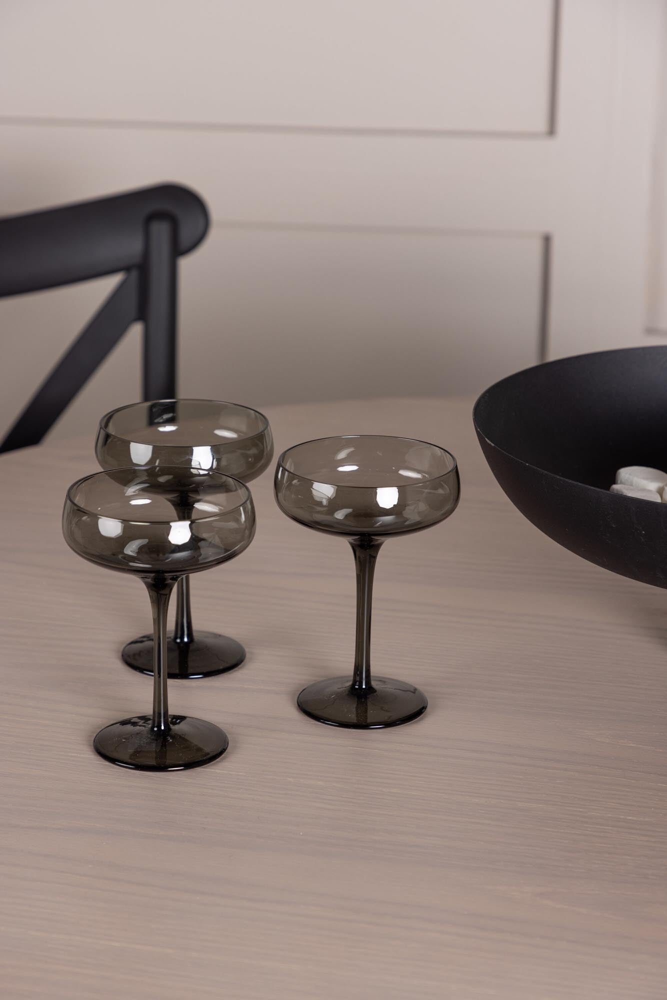 Stilvolles Olivia Esszimmer Set mit modernem runden Tisch und 4 komfortablen Stühlen für einladende Essmomente.