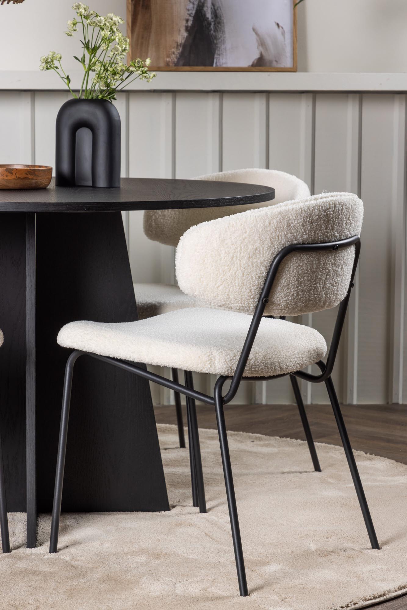 Stilvolles Bootcut Esszimmerset mit 110 cm Durchmesser, ideal für gesellige Runden. Hochwertige Materialien und modernes Design vereinen Komfort und Eleganz.