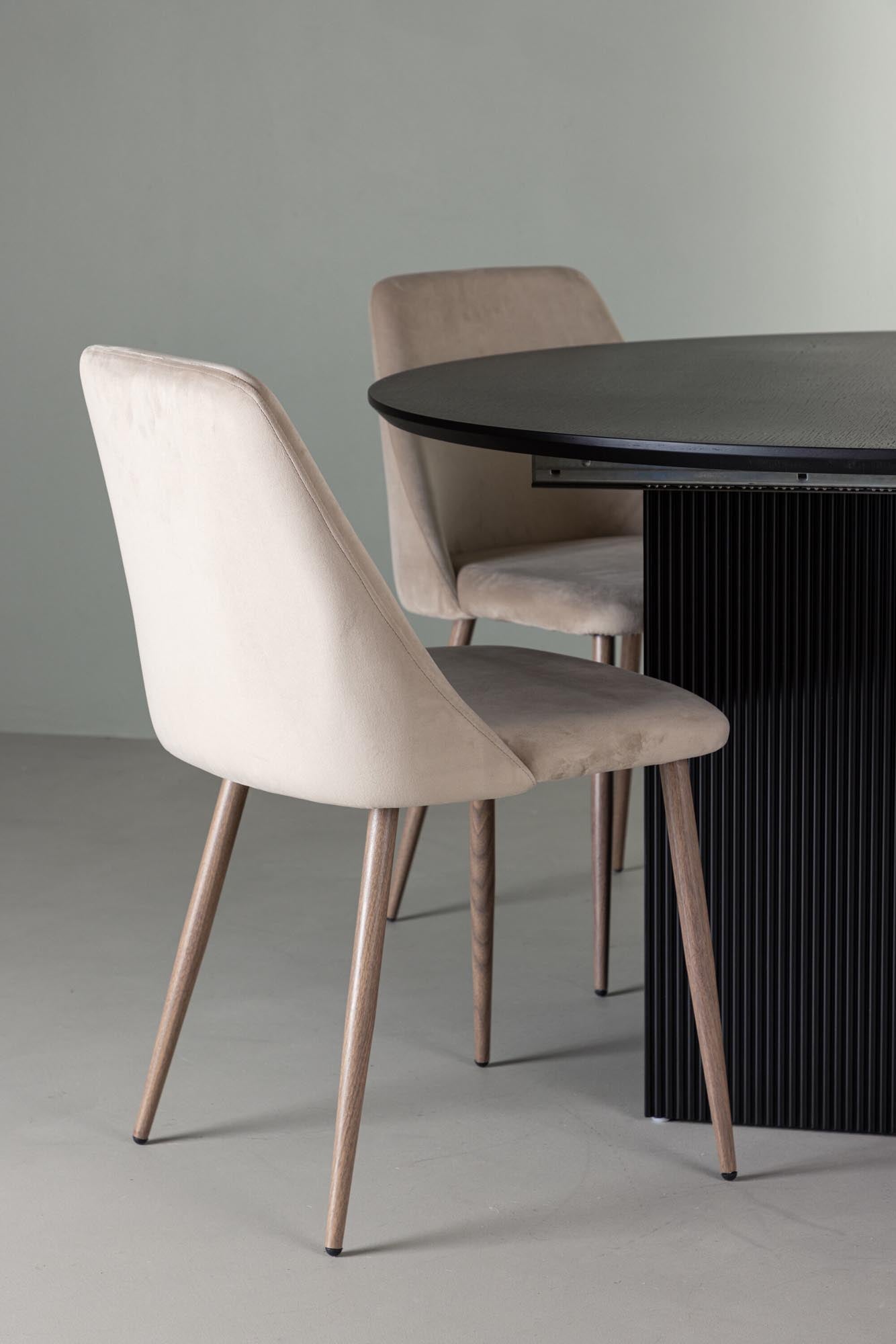 Elegantes Matilda Esszimmerset mit runden Tisch (130cm) und 4 komfortablen Samtstühlen. Ideal für stilvolle Essbereiche.