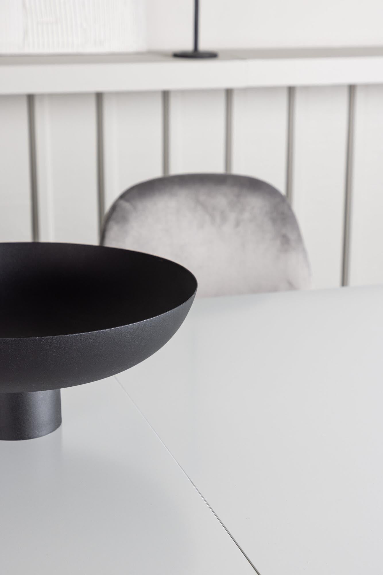 Entdecken Sie das Disa Esszimmerset von Venture Home: Ausziehbarer Tisch (120-160 cm) und 4 stilvolle Eva-Stühle in luxuriösem Samt. Ideal für jeden Anlass!