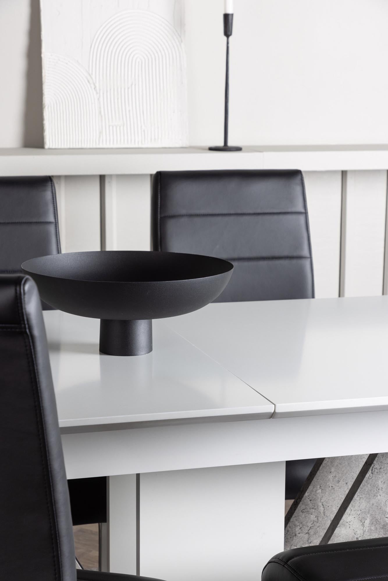 Elegantes Disa Esszimmerset: Ausziehbarer Tisch und bequeme Tempo-Stühle für stilvolle Esszimmergestaltung.