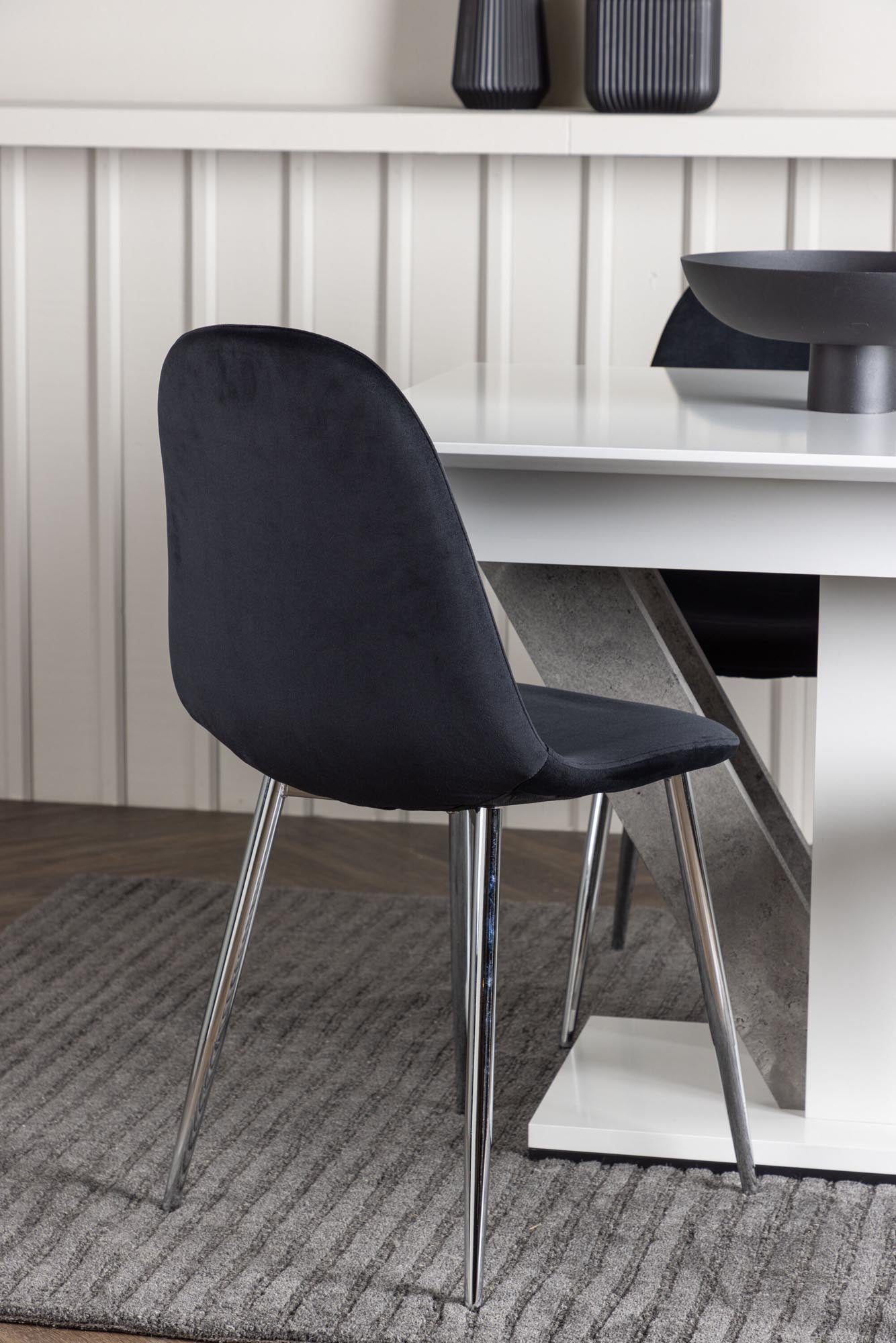 Stilvolles Disa Esszimmerset mit ausziehbarem Tisch (120-160 cm) und 4 komfortablen Polar-Stühlen in edlem Design für gesellige Abende.