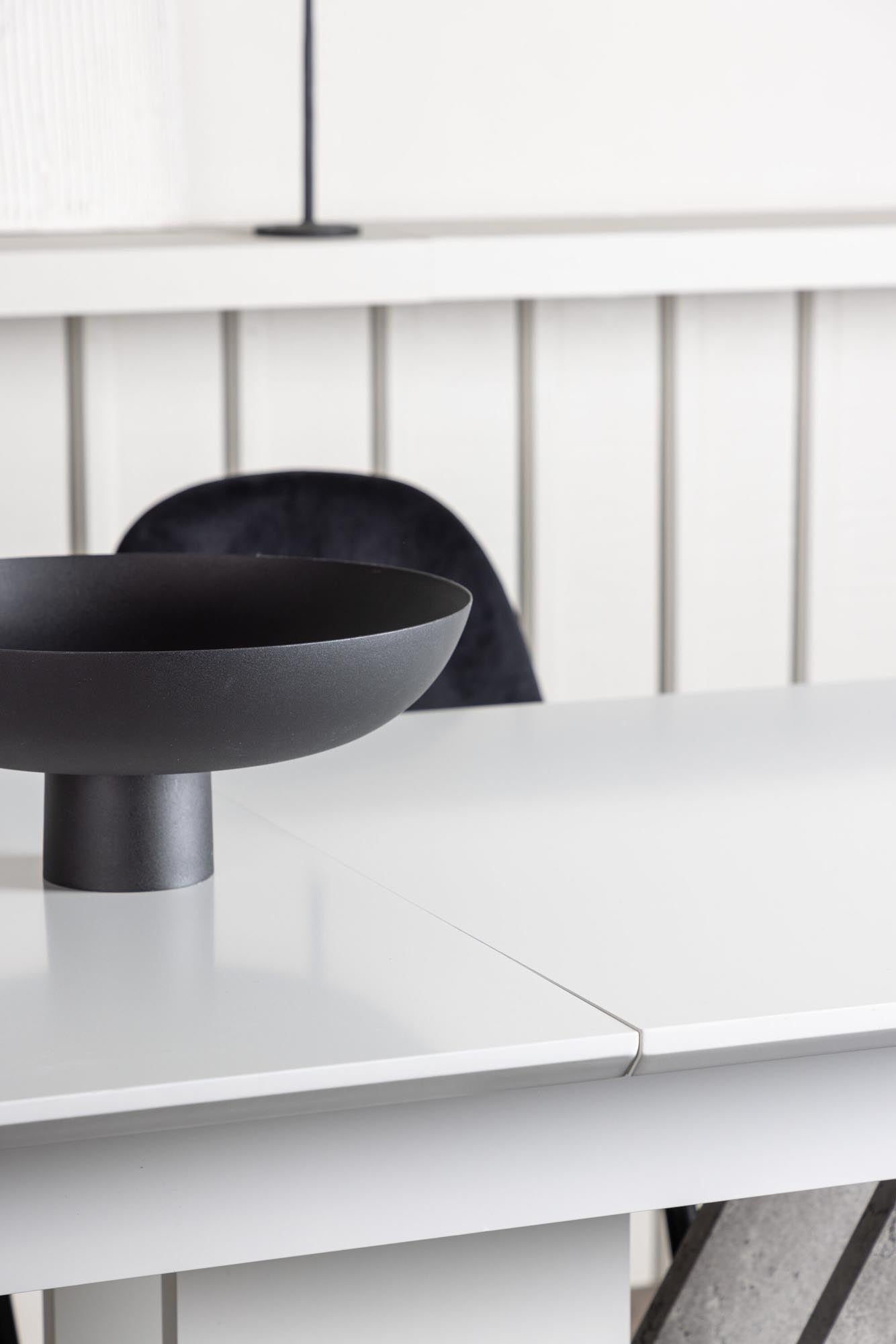 Stilvolles Disa Esszimmerset mit ausziehbarem Tisch und 4 luxuriösen Polar-Stühlen. Perfekt für gemütliche Familienessen und festliche Anlässe.