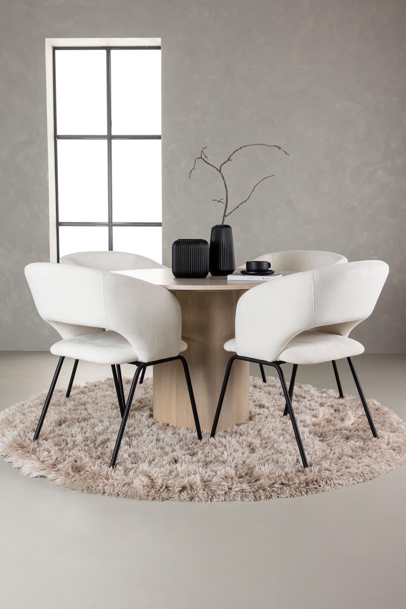 Entdecken Sie das Olivia Esszimmerset von Venture Home: Moderner runder Tisch (110 cm) mit 4 ergonomischen Stühlen für stilvolle Essmomente.