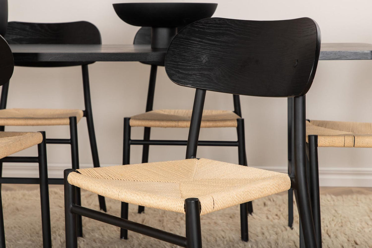 Esszimmer Set Uno mit Stuhl Polly: rechteckiger Tisch mit Walnuss-Furnierplatte und schwarzem Metallgestell, sechs Stühle mit schwarzem Seilsitz.