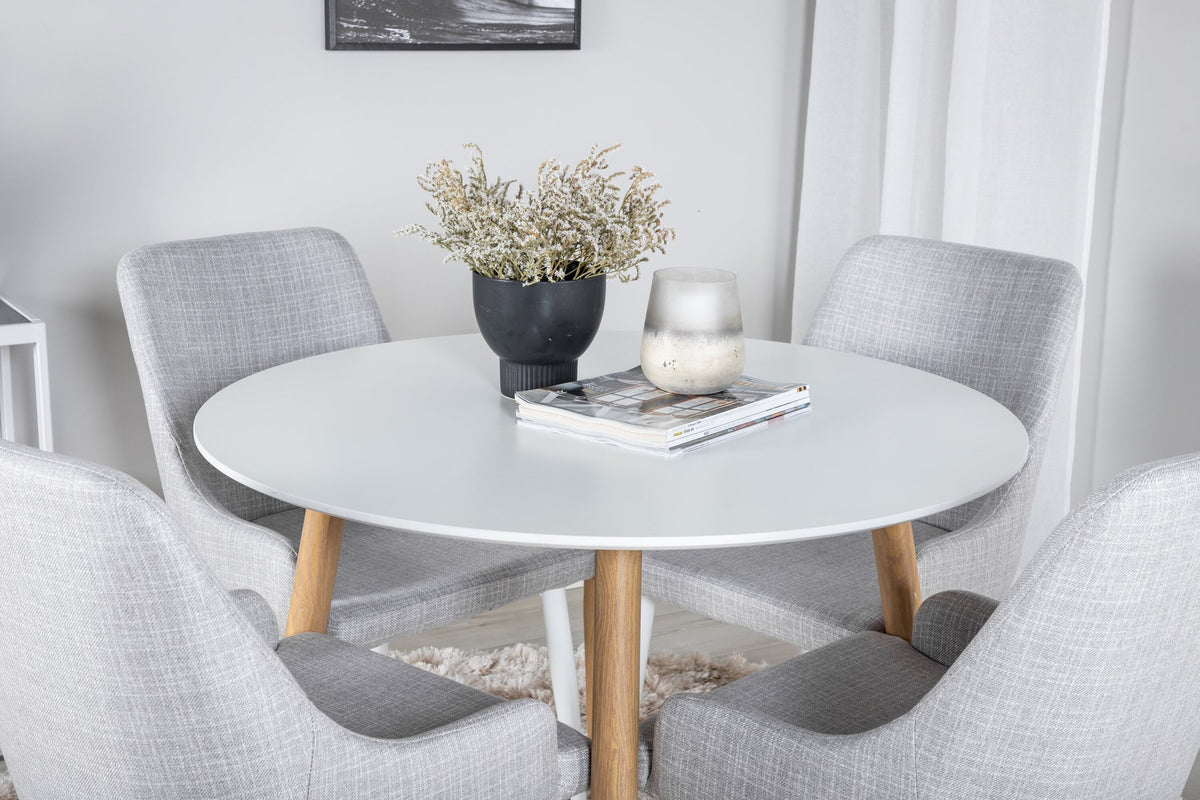 Esszimmer Set Plaza: heller Tisch mit weiss-grauer Oberfläche aus MDF und vier Stühle mit Stahlgestell, moderne Formensprache.