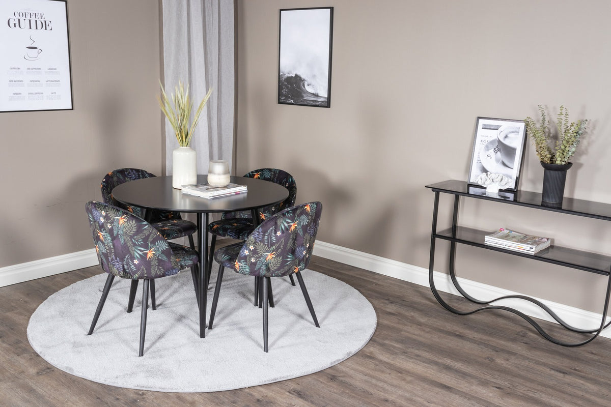 Esszimmer Set Plaza mit Stuhl Velvet von Venture Home: Esstisch aus MDF mit Stahlgestell in Schwarz, dazu vier gepolsterte Stühle.