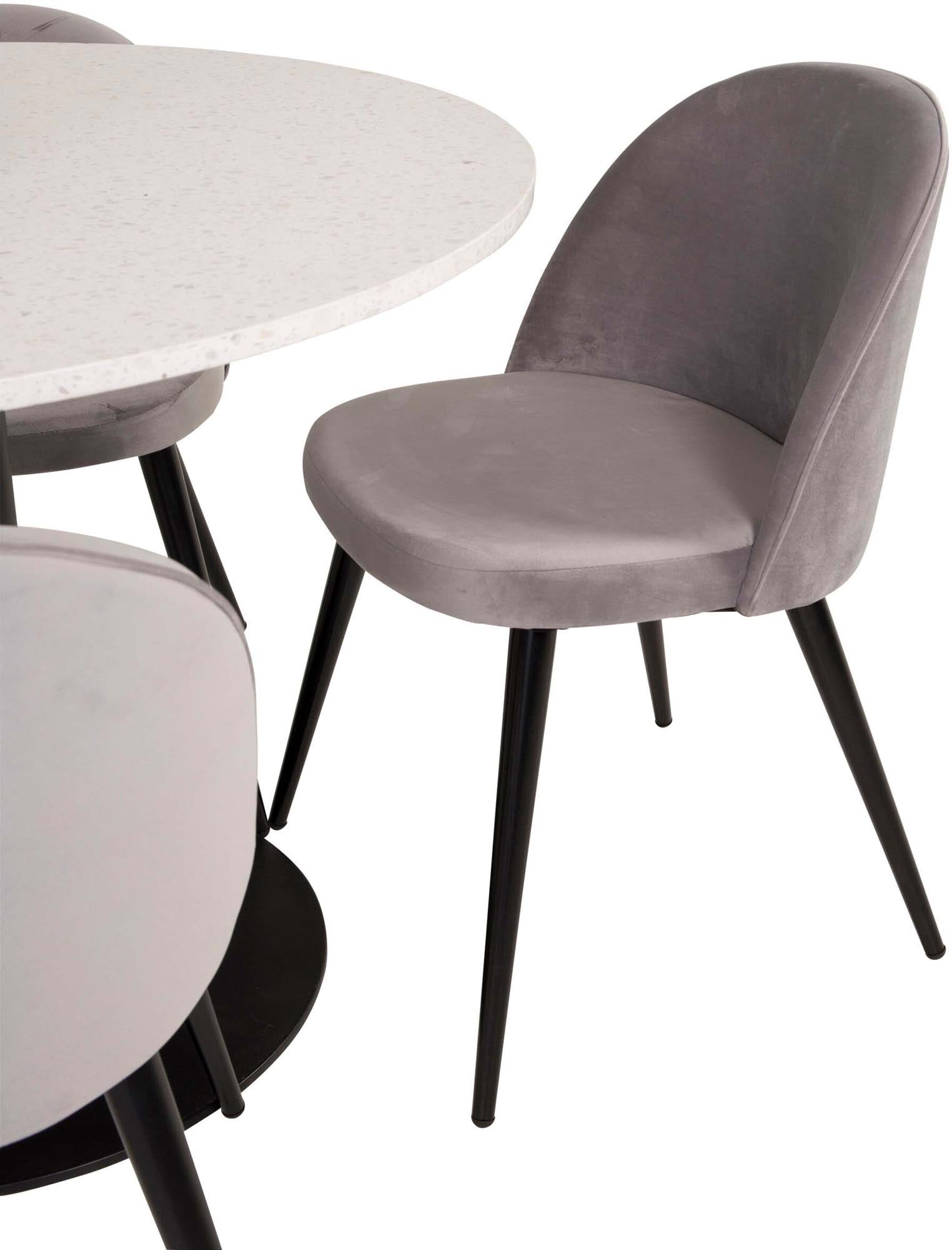 Entdecken Sie das Razzia Esszimmerset von Venture Home: Ein stilvoller Tisch (106 cm) und 4 elegante Velvet-Stühle für ein modernes Esszimmer.