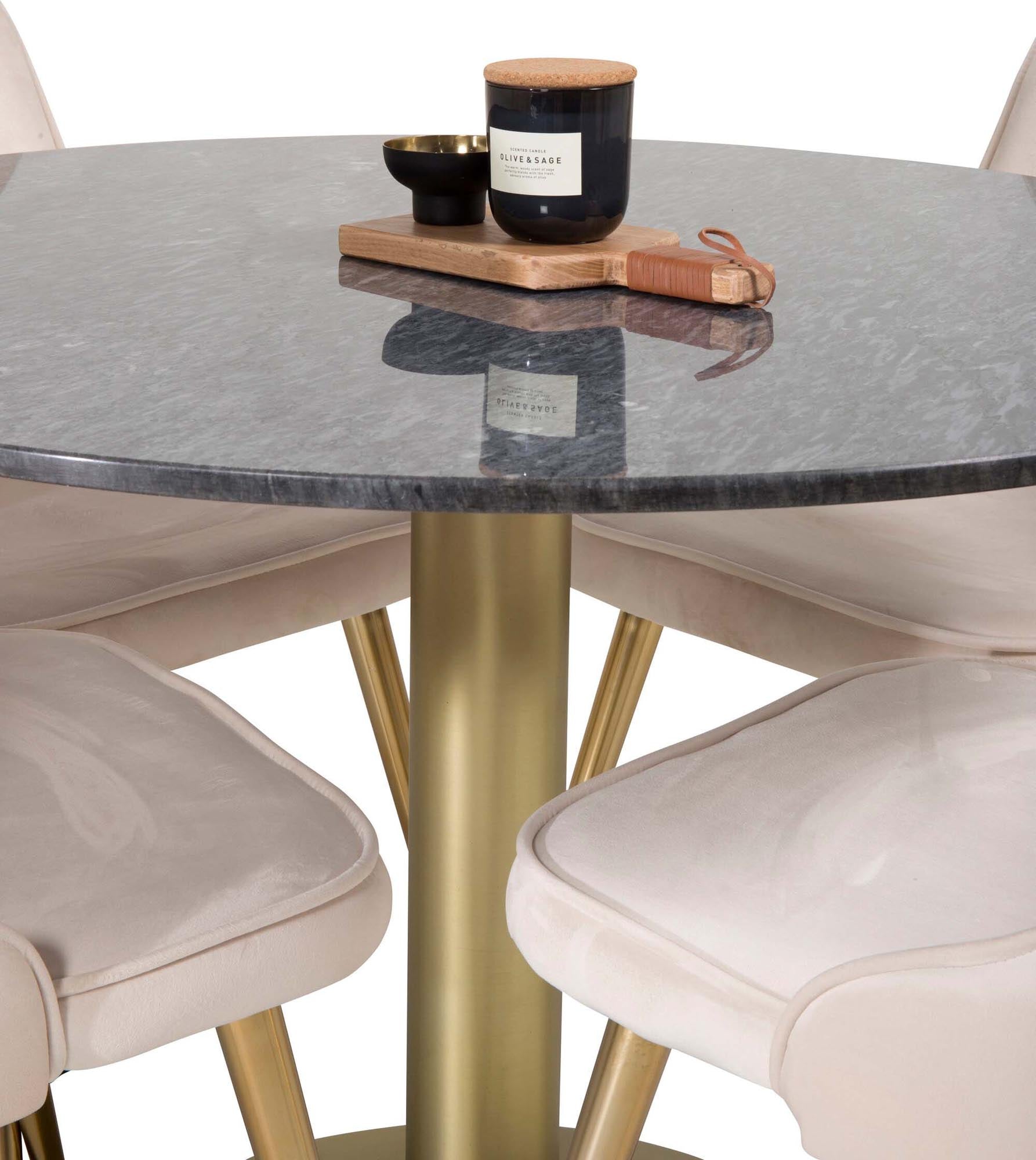 Stilvolles Esszimmerset mit runder Marmortischplatte und ergonomischen Samtstühlen für einladende Dinnerabende und unvergessliche Momente.