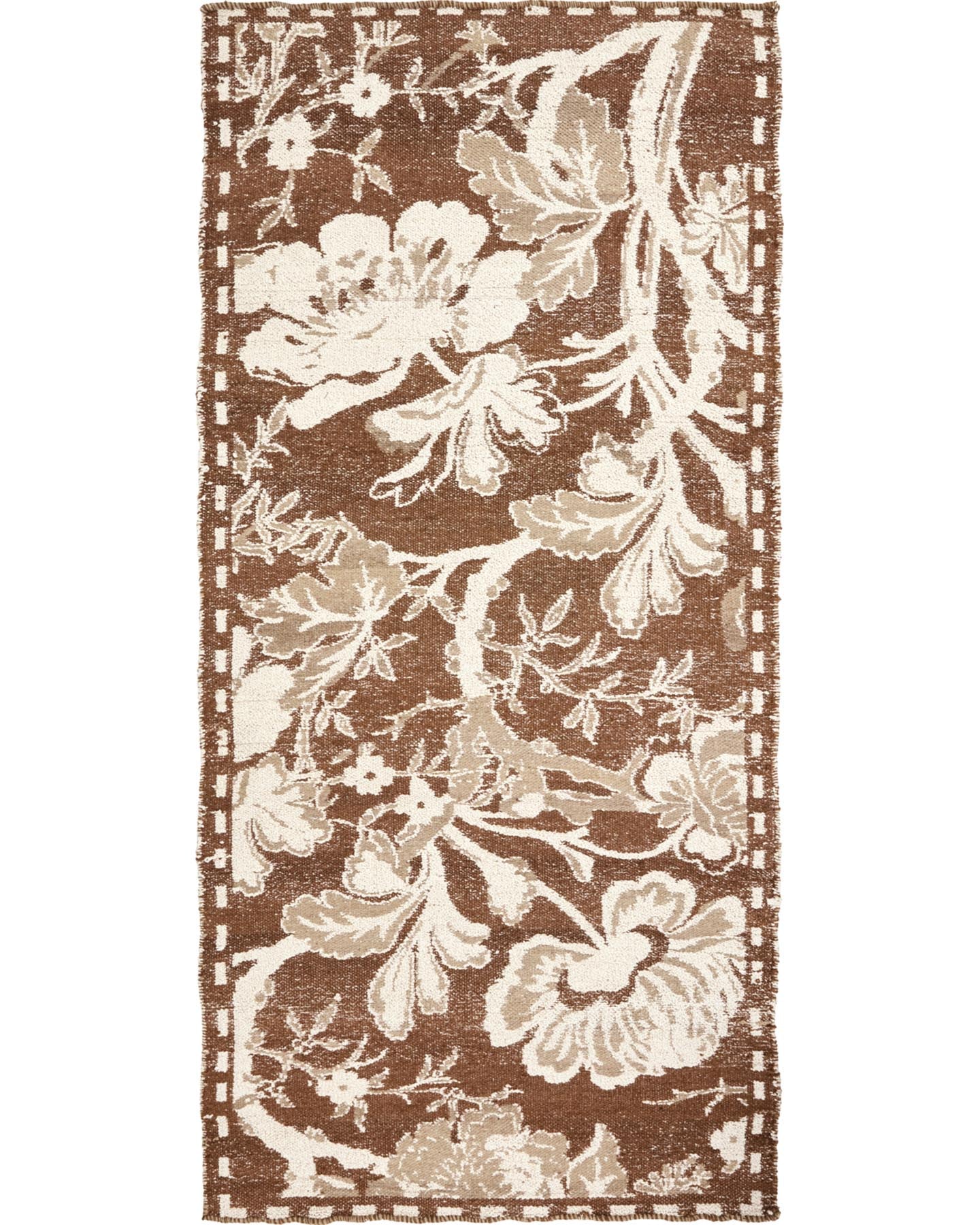 Verleihen Sie Ihrem Raum mit dem HDBloss Teppich in Braun von House Doctor eine warme Note. Handgefertigt aus hochwertigen Materialien, vereint er Eleganz und Komfort.