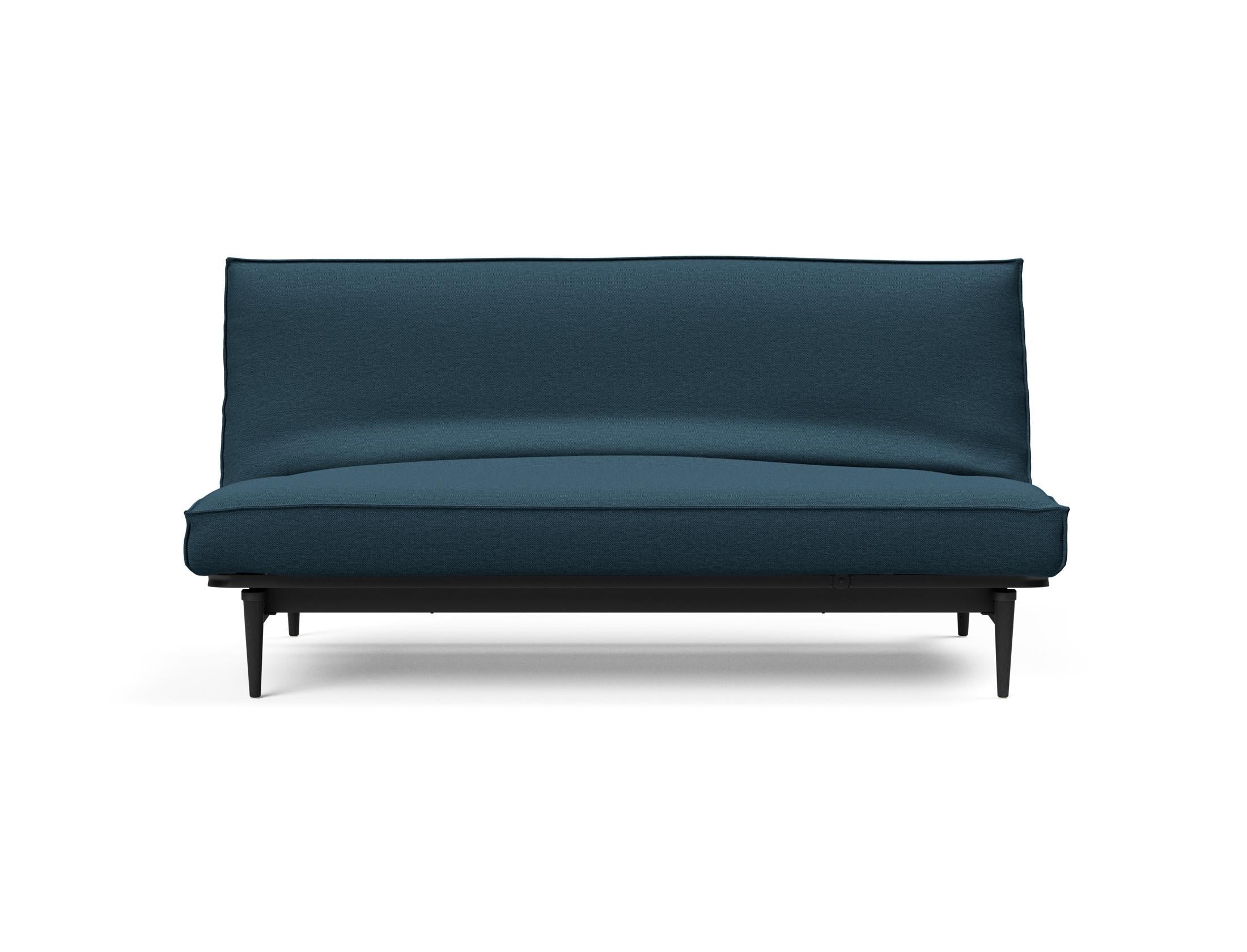 Modernes Bettsofa Colpus 140 in Schwarz mit Eiche-Akzenten, ideal für vielseitige Nutzung und stilvolle Einrichtung.