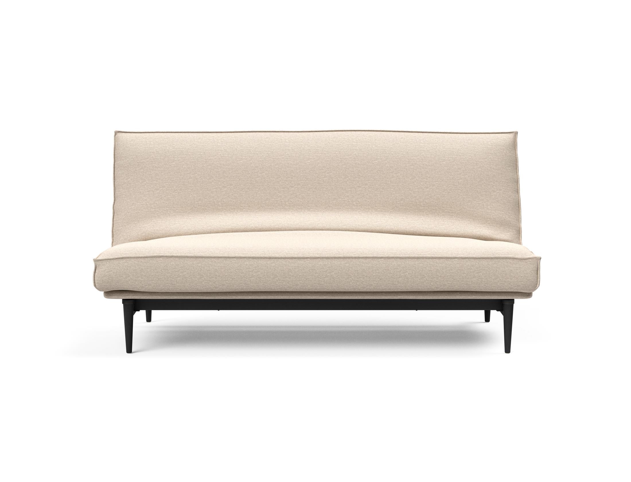 Modernes Colpus Bettsofa in schwarzer Eiche, perfekt für kompakte Wohnräume, vereint elegantes Design mit praktischer Schlafgelegenheit.