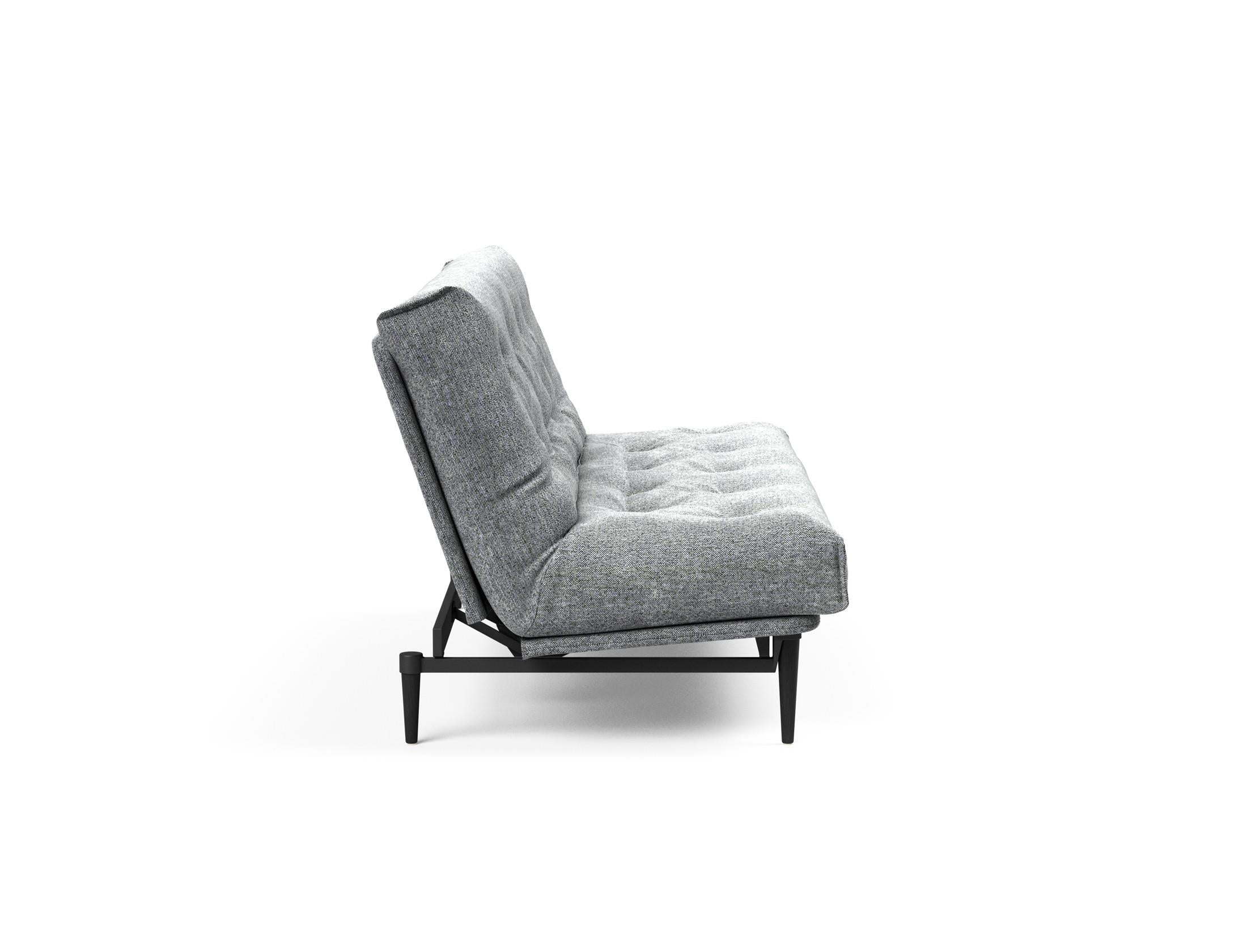 Erleben Sie das Colpus Bettsofa 140 in Nordic Eiche schwarz – ein elegantes Möbelstück, das als Sofa und Bett höchsten Komfort bietet.