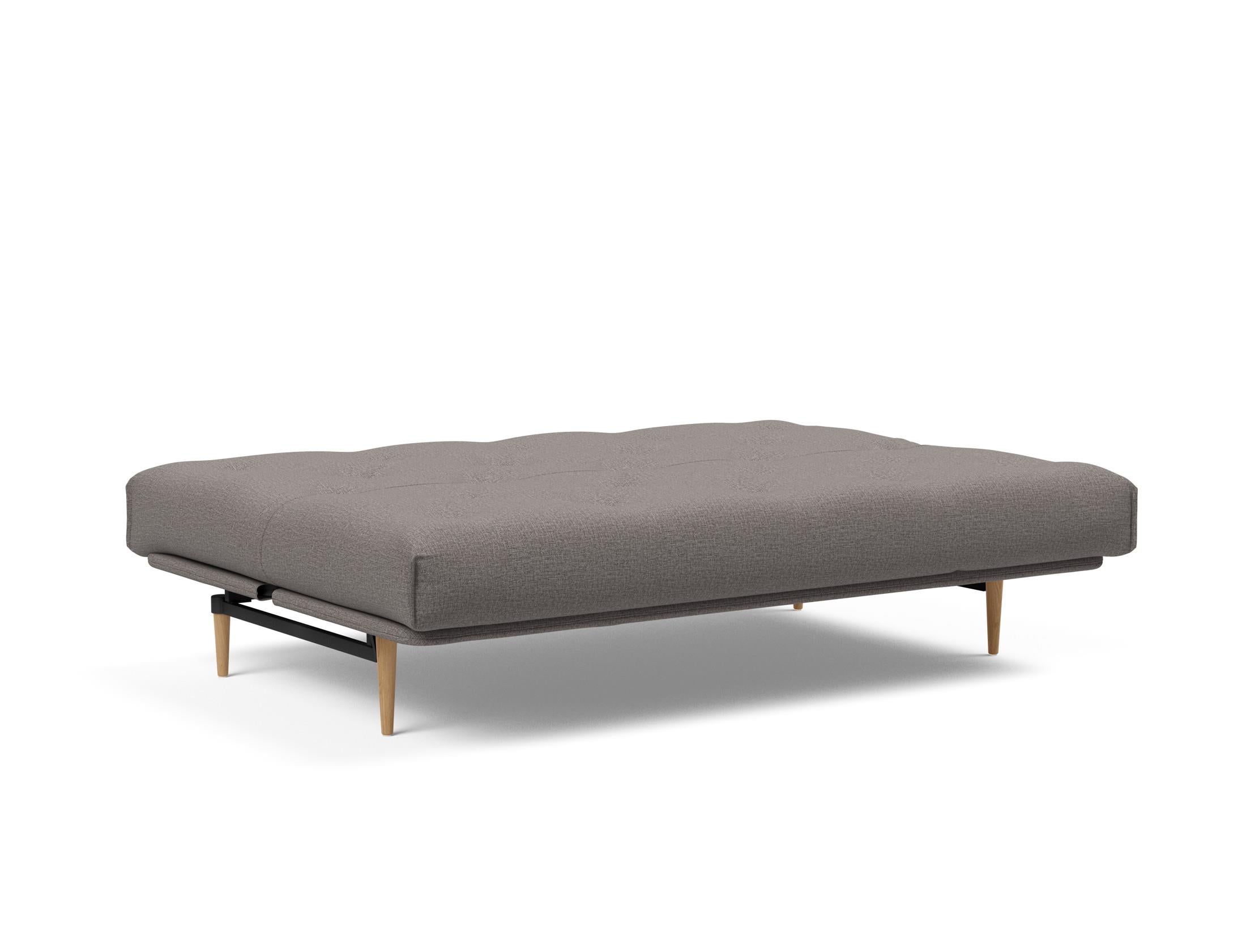 Erleben Sie das Colpus Bettsofa 140 Nordic: Stilvolles Möbelstück mit Soft Spring Matratze und praktischem, abnehmbarem Bezug für höchsten Komfort.