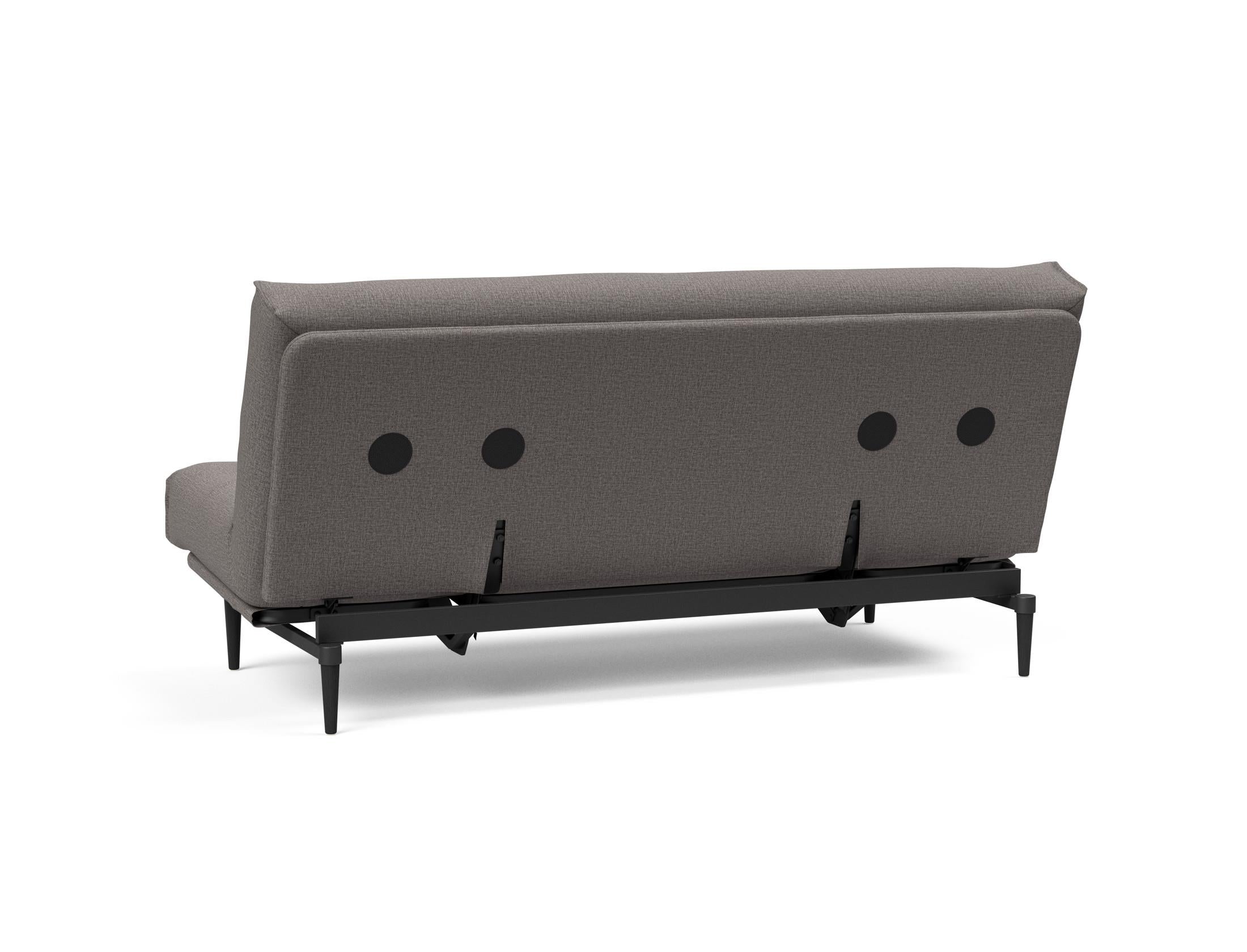 Erleben Sie das Colpus Bettsofa 140 in Nordic Eiche schwarz – ein elegantes Möbelstück, das als Sofa und Bett höchsten Komfort bietet.