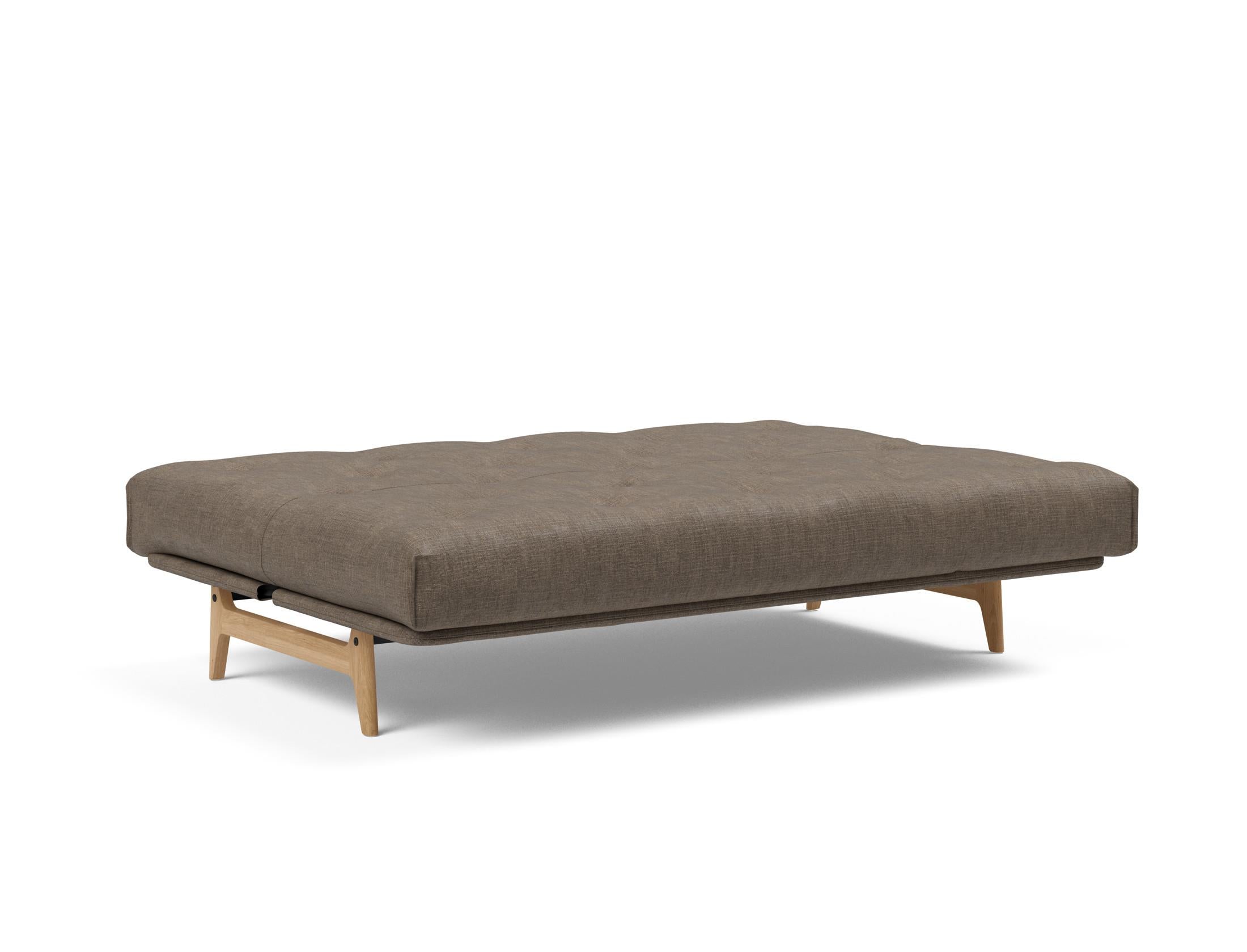 Entdecken Sie das Aslak 140 Bettsofa Nordic: Stilvolles, umweltfreundliches Design mit hochwertiger Matratze für optimalen Schlafkomfort und Flexibilität.