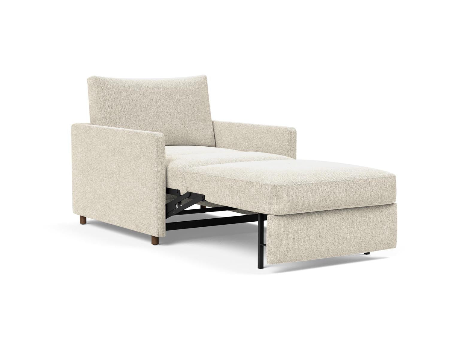 Der Neah Sessel mit Slim Armlehnen bietet elegantes Design und multifunktionalen Komfort, ideal für moderne Wohnräume und Gästeübernachtungen.