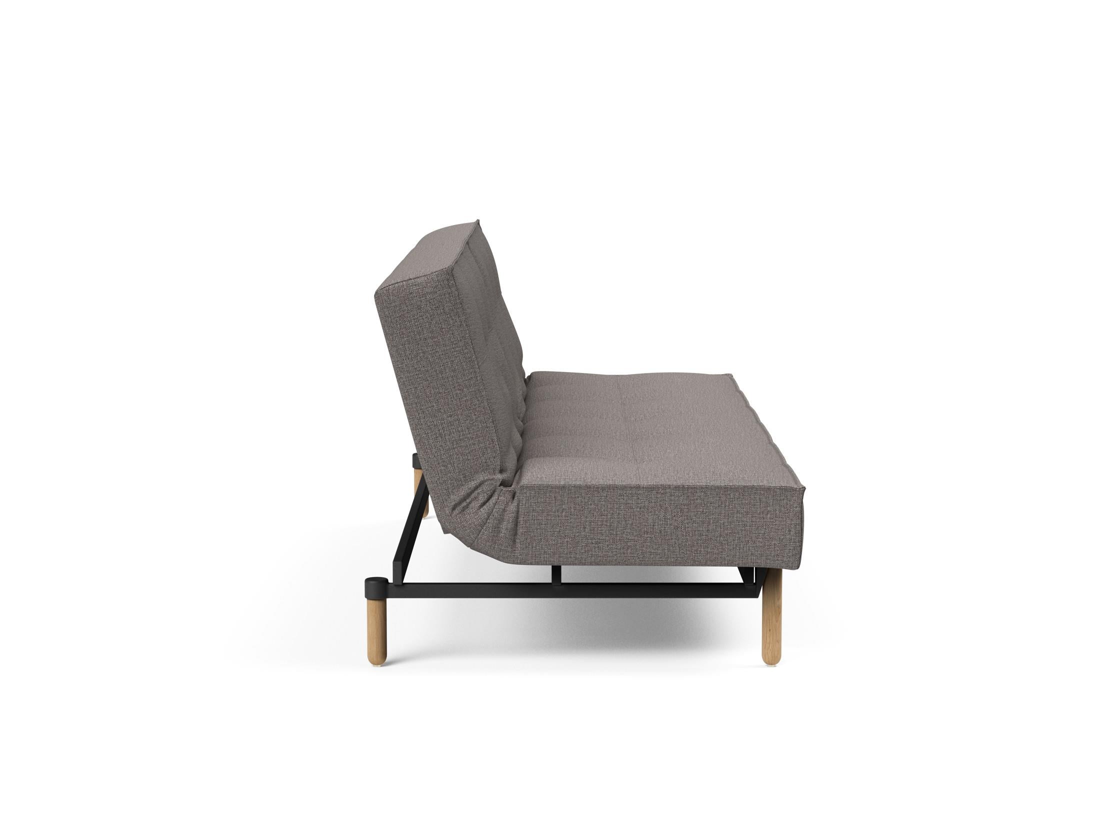 Das Splitback Sofabett 115 Stem von Innovation Living bietet stilvolle Flexibilität und Komfort, ideal für kleine Räume und Übernachtungsgäste.