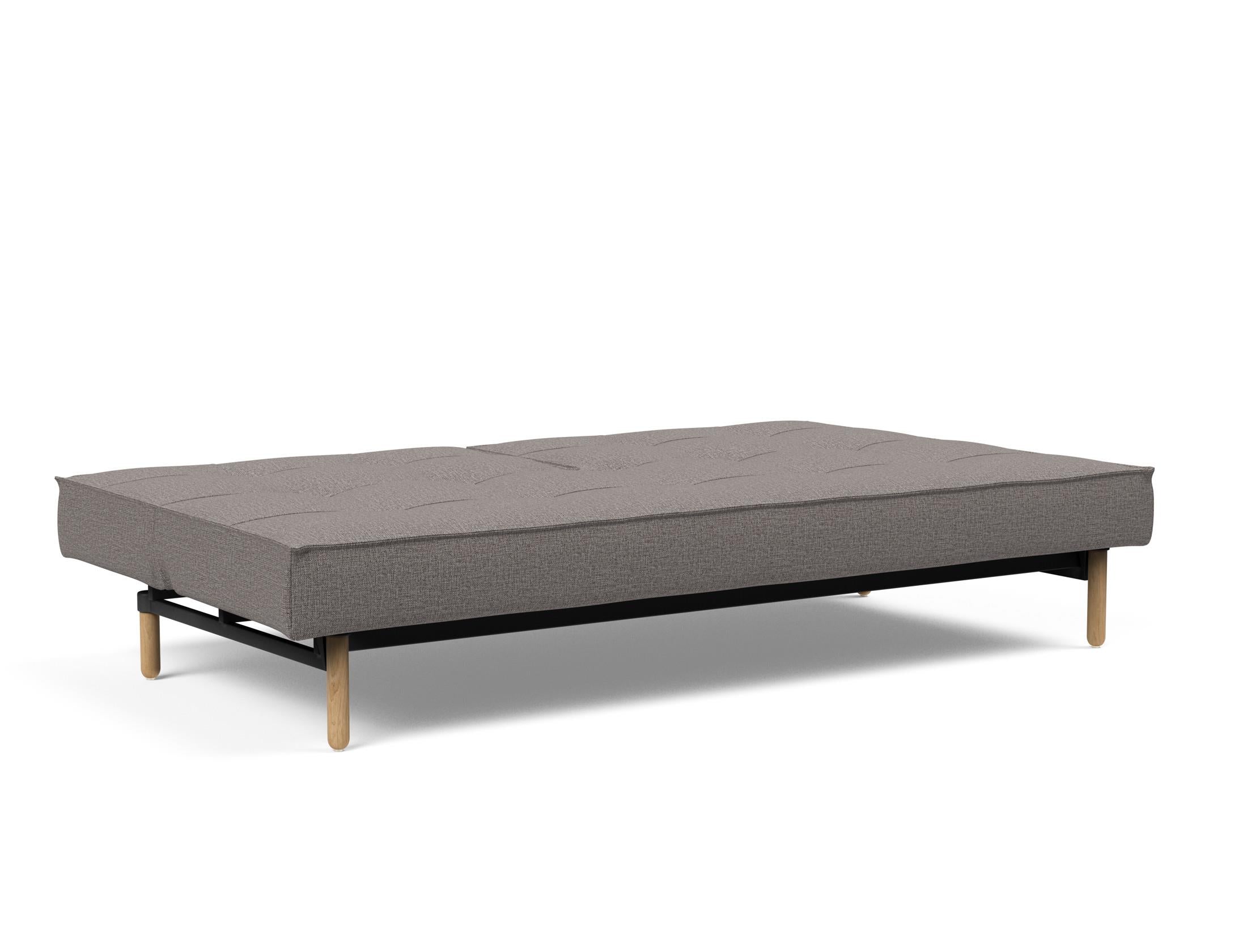 Das Splitback Sofabett 115 Stem von Innovation Living bietet stilvolle Flexibilität und Komfort, ideal für kleine Räume und Übernachtungsgäste.