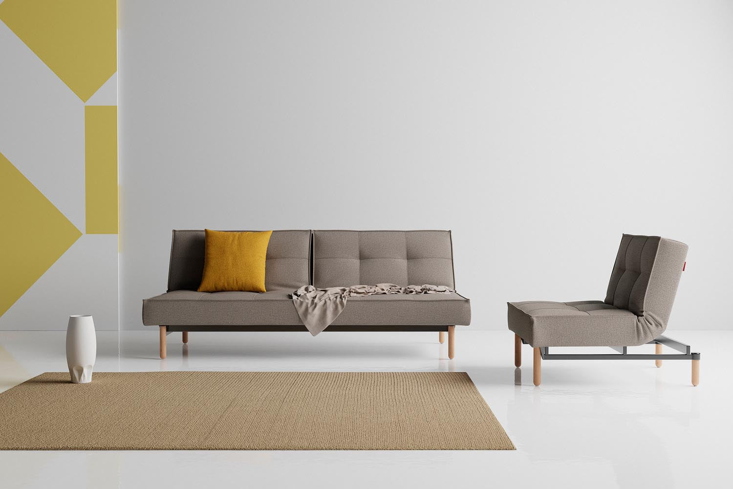 Das Splitback Sofabett 115 Stem von Innovation Living bietet stilvolle Flexibilität und Komfort, ideal für kleine Räume und Übernachtungsgäste.