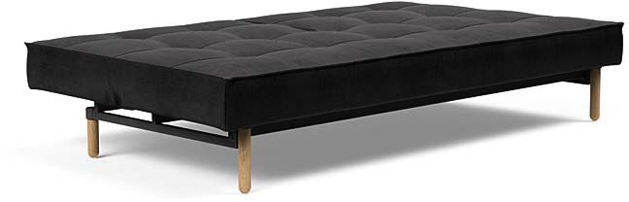 Das Splitback Sofabett 115 Stem von Innovation Living bietet stilvolle Flexibilität und Komfort, ideal für kleine Räume und Übernachtungsgäste.