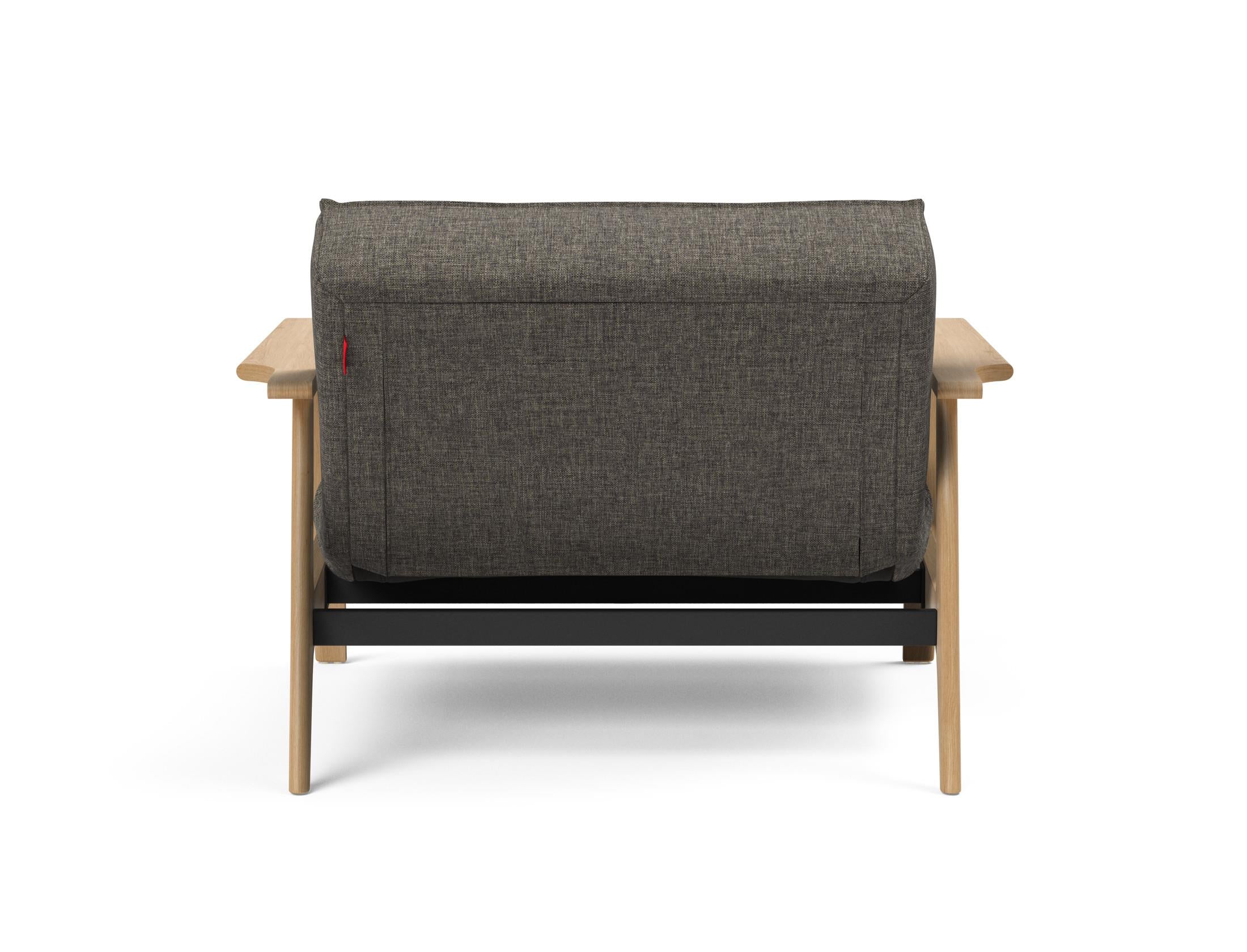 Erleben Sie den Splitback Frej Sessel: modernes dänisches Design, hochwertige Materialien und vielseitige Nutzungsmöglichkeiten für Ihr Zuhause.