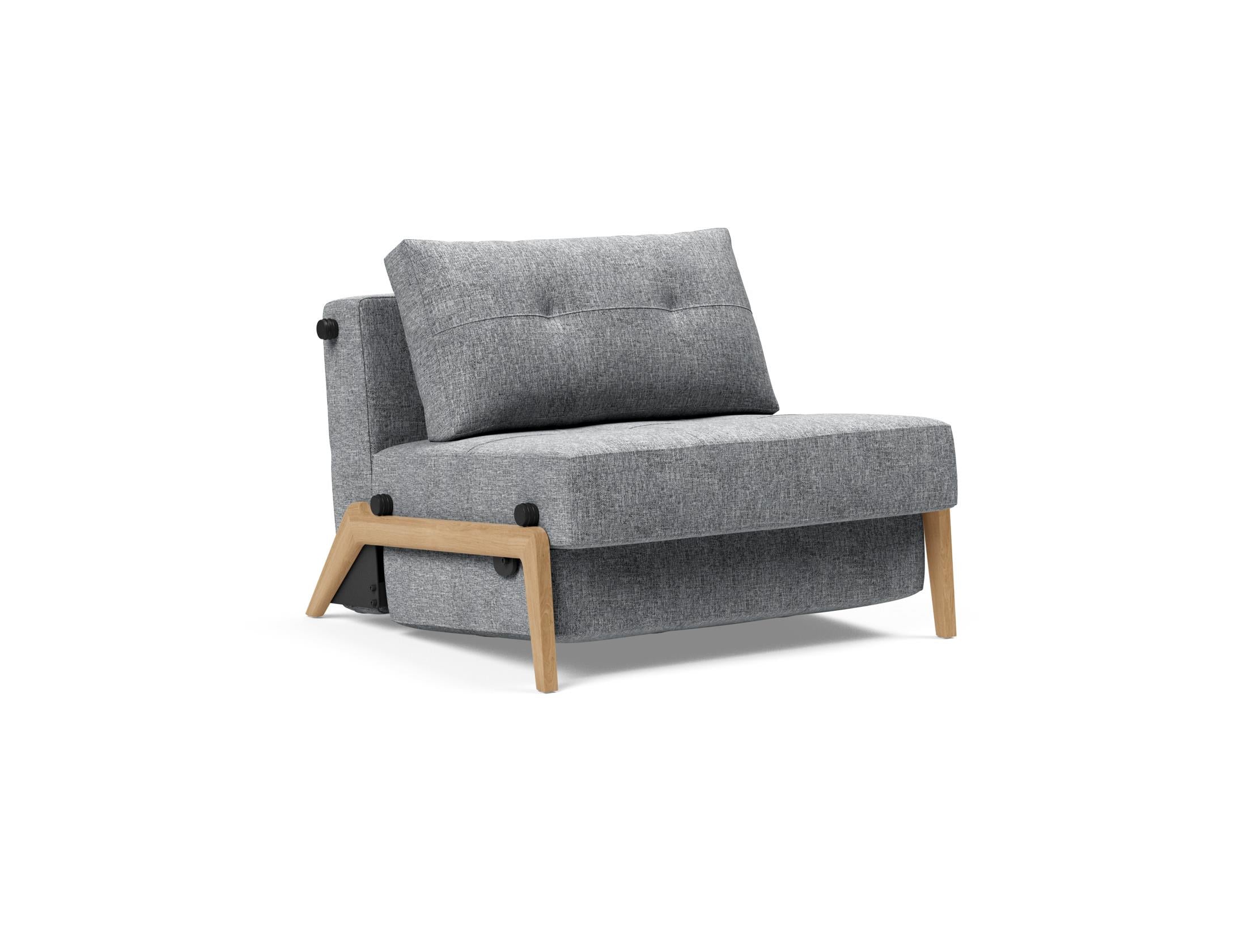 Entdecken Sie den Cubed Sessel 90 von Innovation Living: Ein eleganter, multifunktionaler Sessel mit modernem Design, der sich mühelos in ein Bett verwandelt.